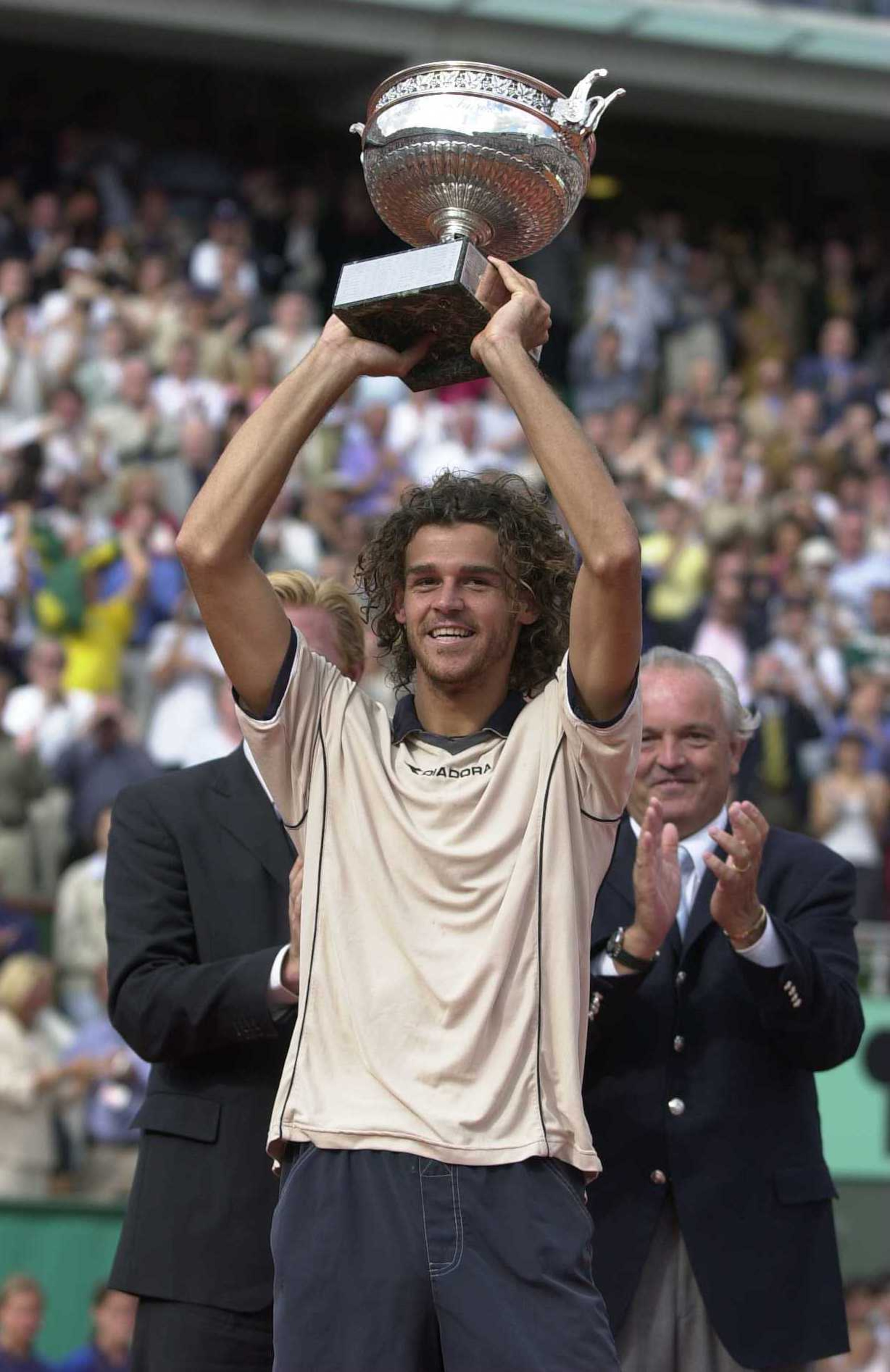 11Jun 2000: Gustavo Kuerton of Brazil with the trophy after his  victory over Magnus Norman of Sweden  in the Mens Singles Final at the  French Open, Roland Garros, Paris, France. Mandatory Credit: Clive Brunskill/ALLSPORT