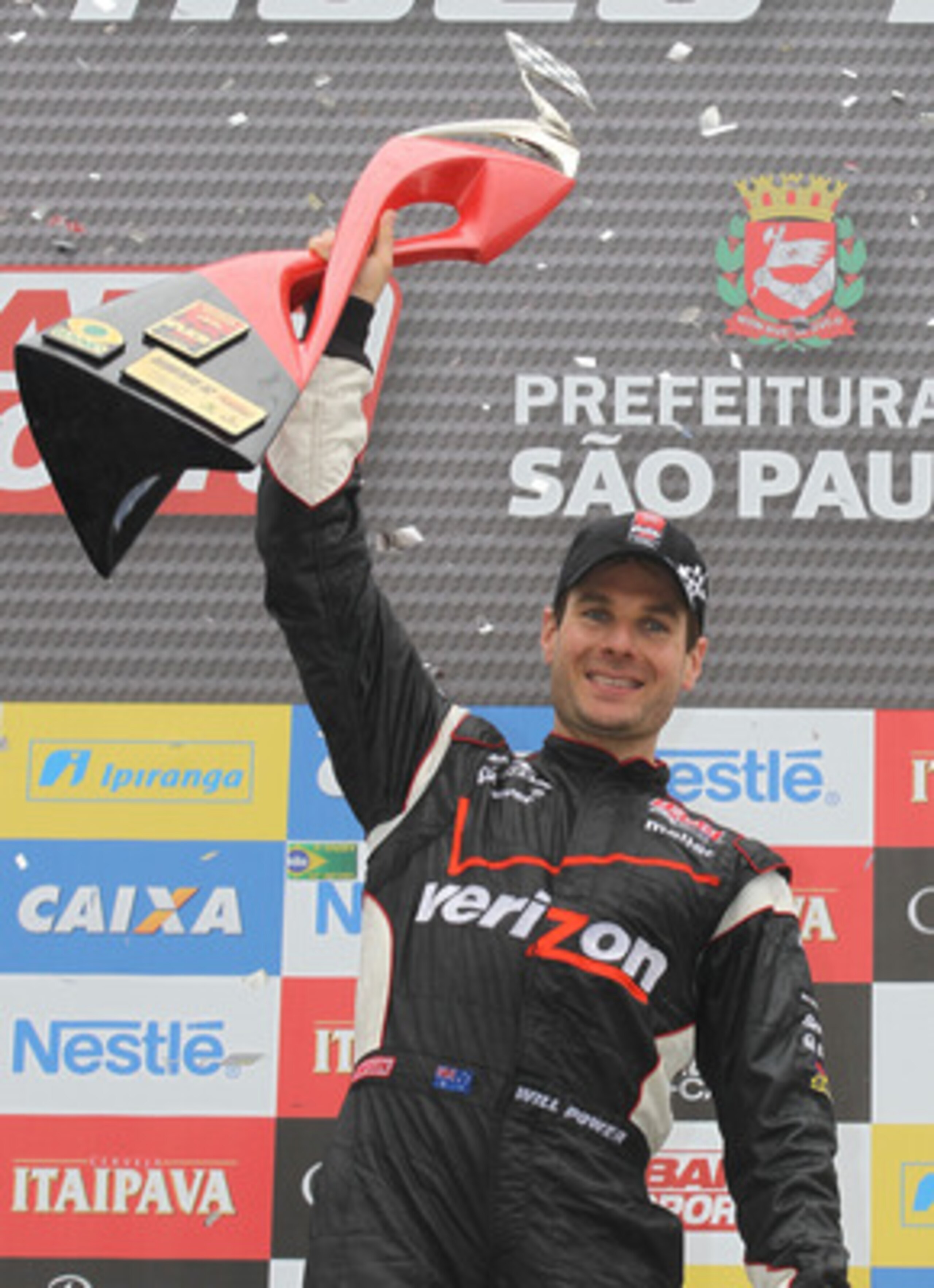 SAO PAULO, BRAZIL - MAY 02:  Will Power of Australia driver of the #12 Verizon Team Penske Dallara Honda celebrates winning the Itaipava Sao Paulo Indy 300  on May 2, 2011 in Sao Paulo, Brazil.  (Photo by Nick Laham/Getty Images)