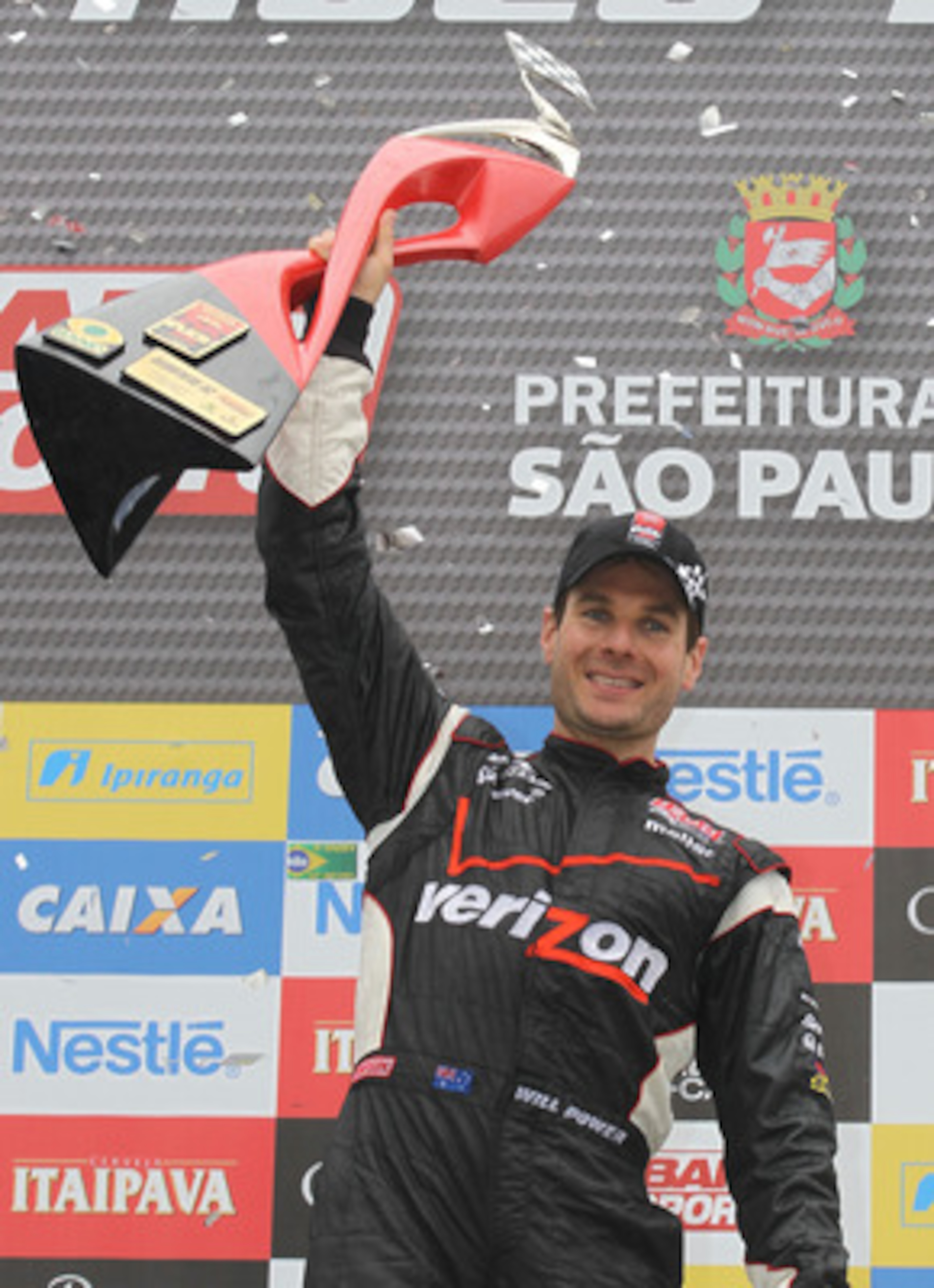 SAO PAULO, BRAZIL - MAY 02:  Will Power of Australia driver of the #12 Verizon Team Penske Dallara Honda celebrates winning the Itaipava Sao Paulo Indy 300  on May 2, 2011 in Sao Paulo, Brazil.  (Photo by Nick Laham/Getty Images)