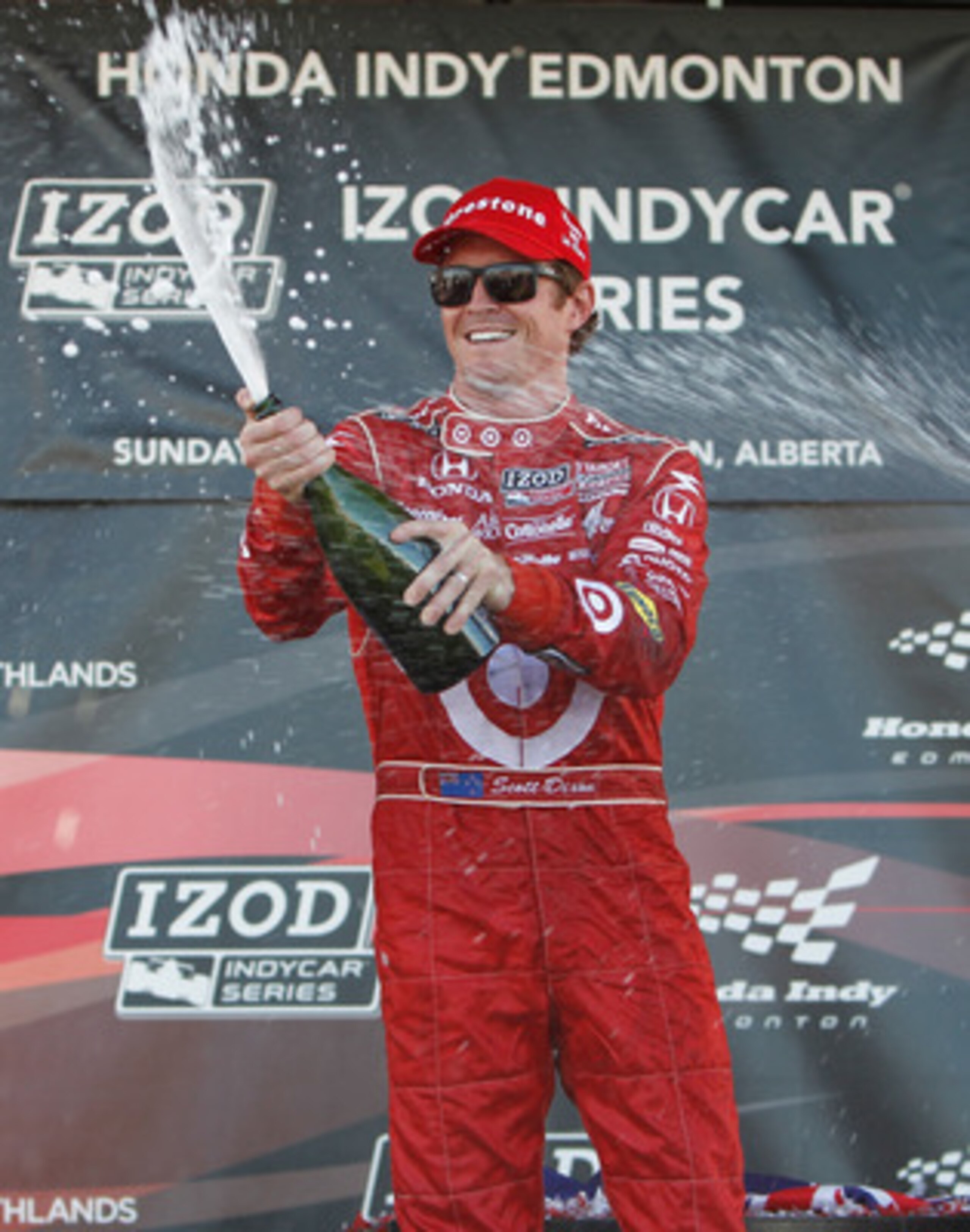 EDMONTON, AB - JULY 25:  Scott Dixon driver of the #9 Target Chip Ganassi Racing dallara Honda sprays champagne after winning  the Indy Car Series Honda Indy Edmonton on July 25, 2010 at Edmonton City Centre Airport in Edmonton, Alberta, Canada.  (Photo b