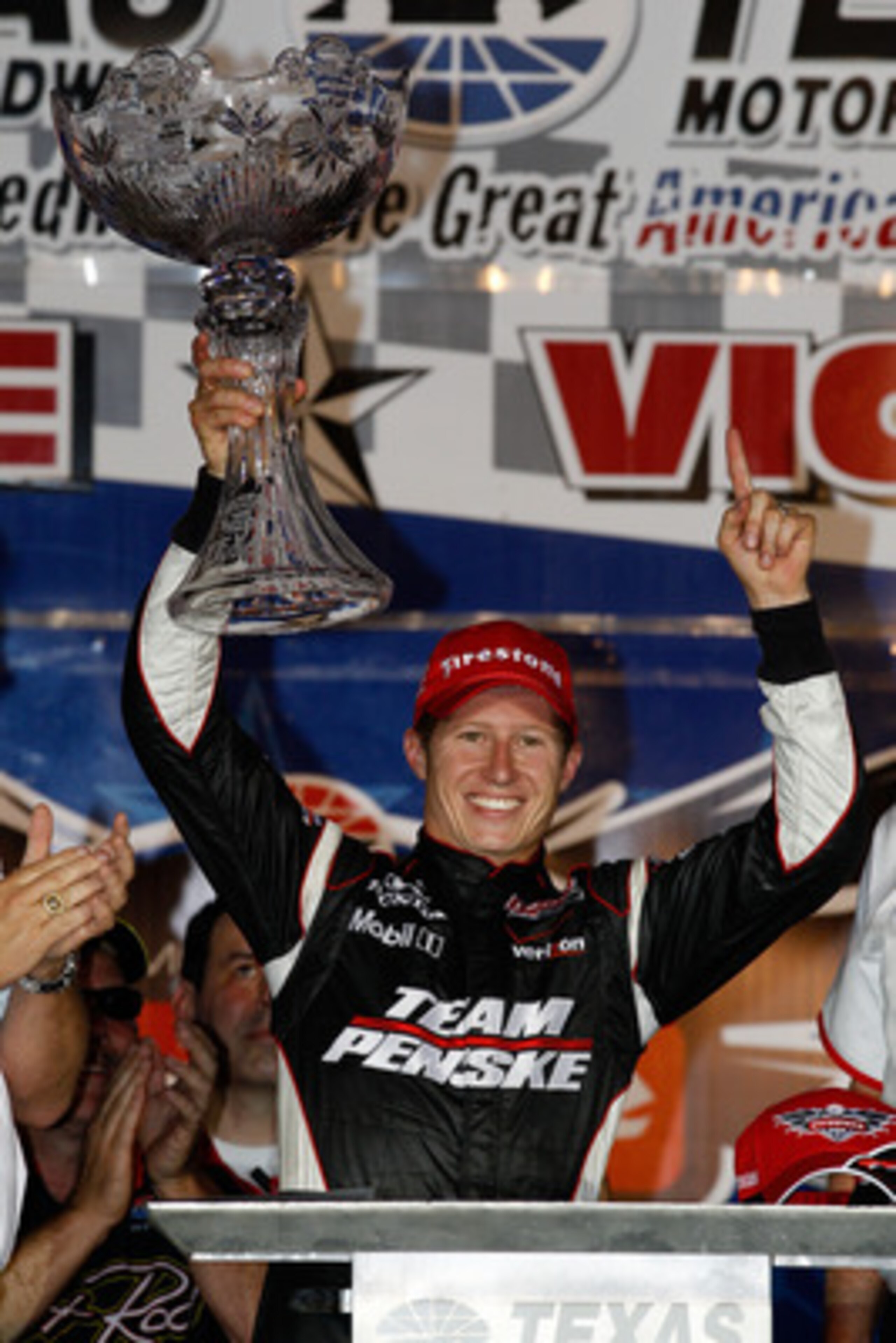 FORT WORTH, TX - JUNE 05:  Ryan Briscoe of Australia, driver of the #6 Team Penske Dallara Honda, celebrates in victory lane after winning the IZOD IndyCar Series Firestone 550k at Texas Motor Speedway June 5, 2010 in Fort Worth, Texas.  (Photo by Chris G
