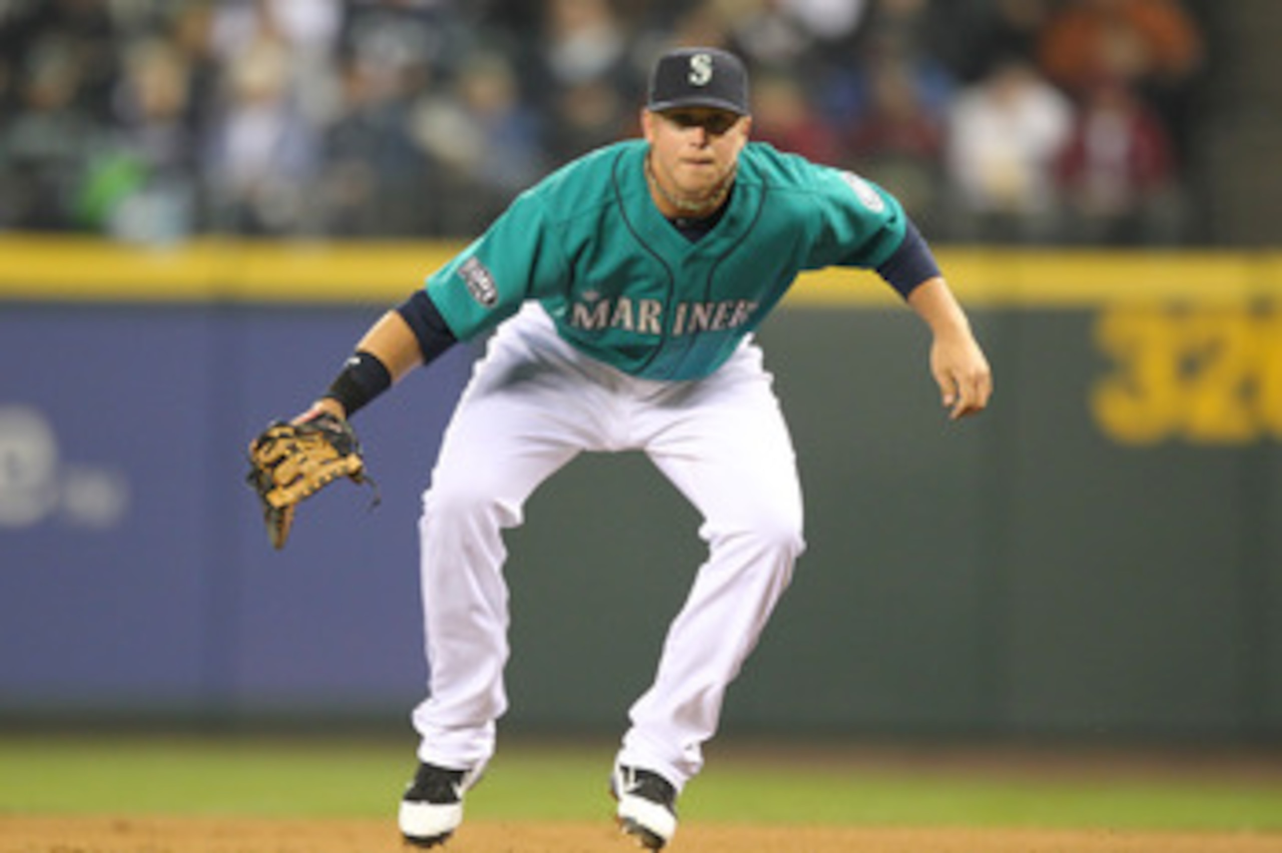 SEATTLE, WA - APRIL 08:  First baseman Justin Smoak #17 of the Seattle Mariners follows the play against the Cleveland Indians during the Mariners' home opener at Safeco Field on April 8, 2011 in Seattle, Washington. (Photo by Otto Greule Jr/Getty Images)
