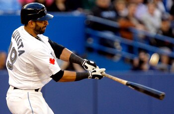 TORONTO, CANADA - MAY 9:  Jose Bautista #19 of the Toronto Blue Jays hits during MLB action against the Detroit Tigers at the Rogers Centre May 9, 2011 in Toronto, Ontario, Canada. (Photo by Abelimages/Getty Images)