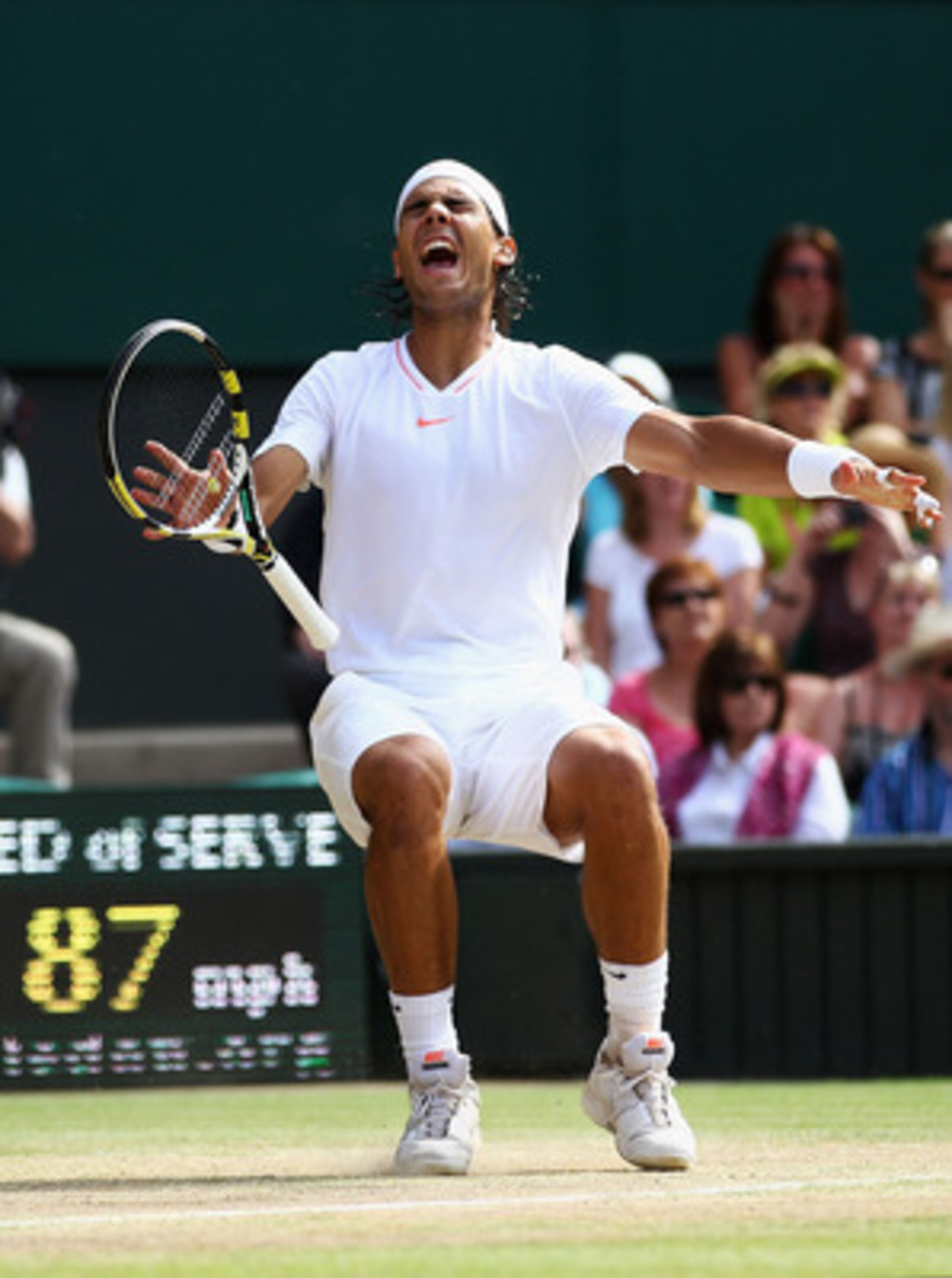 LONDON, ENGLAND - JULY 04: Rafael Nadal of Spain celebrates Championship Point during his Mens Singles Final match against Tomas Berdych of Czech Republic on Day Thirteen of the Wimbledon Lawn Tennis Championships at the All England Lawn Tennis and Croqu LONDON, ENGLAND - JULY 04: Rafael Nadal of Spain celebrates Championship Point during his Mens Singles Final match against Tomas Berdych of Czech Republic on Day Thirteen of the Wimbledon Lawn Tennis Championships at the All England Lawn Tennis and Croqu