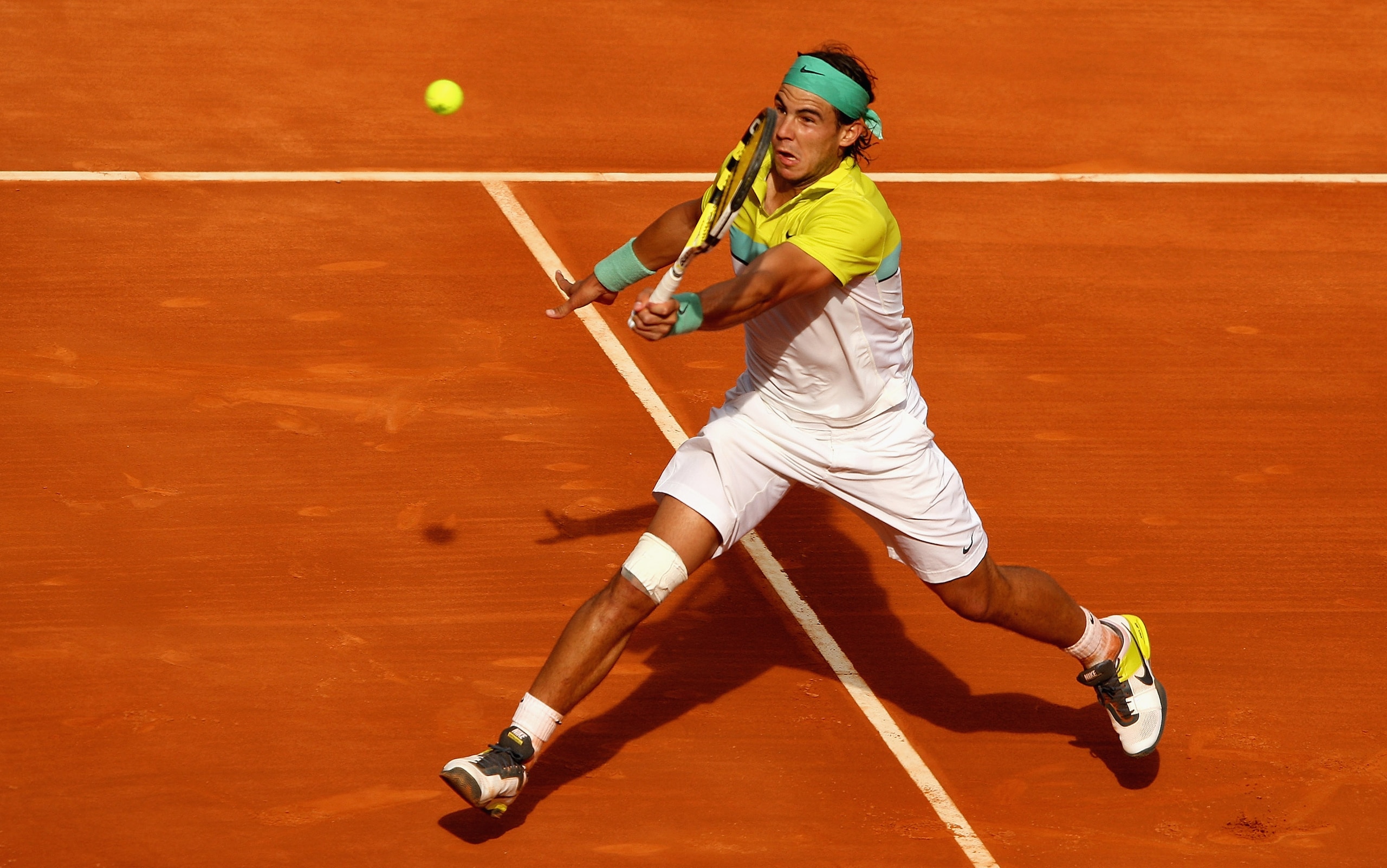 MADRID, SPAIN - MAY 16:  Rafael Nadal of Spain plays a forehand volley against Novak Djokovic of Serbia in their semi-final during the Madrid Open tennis tournament at the Caja Magica on May 16, 2009 in Madrid, Spain.  (Photo by Clive Brunskill/Getty Imag