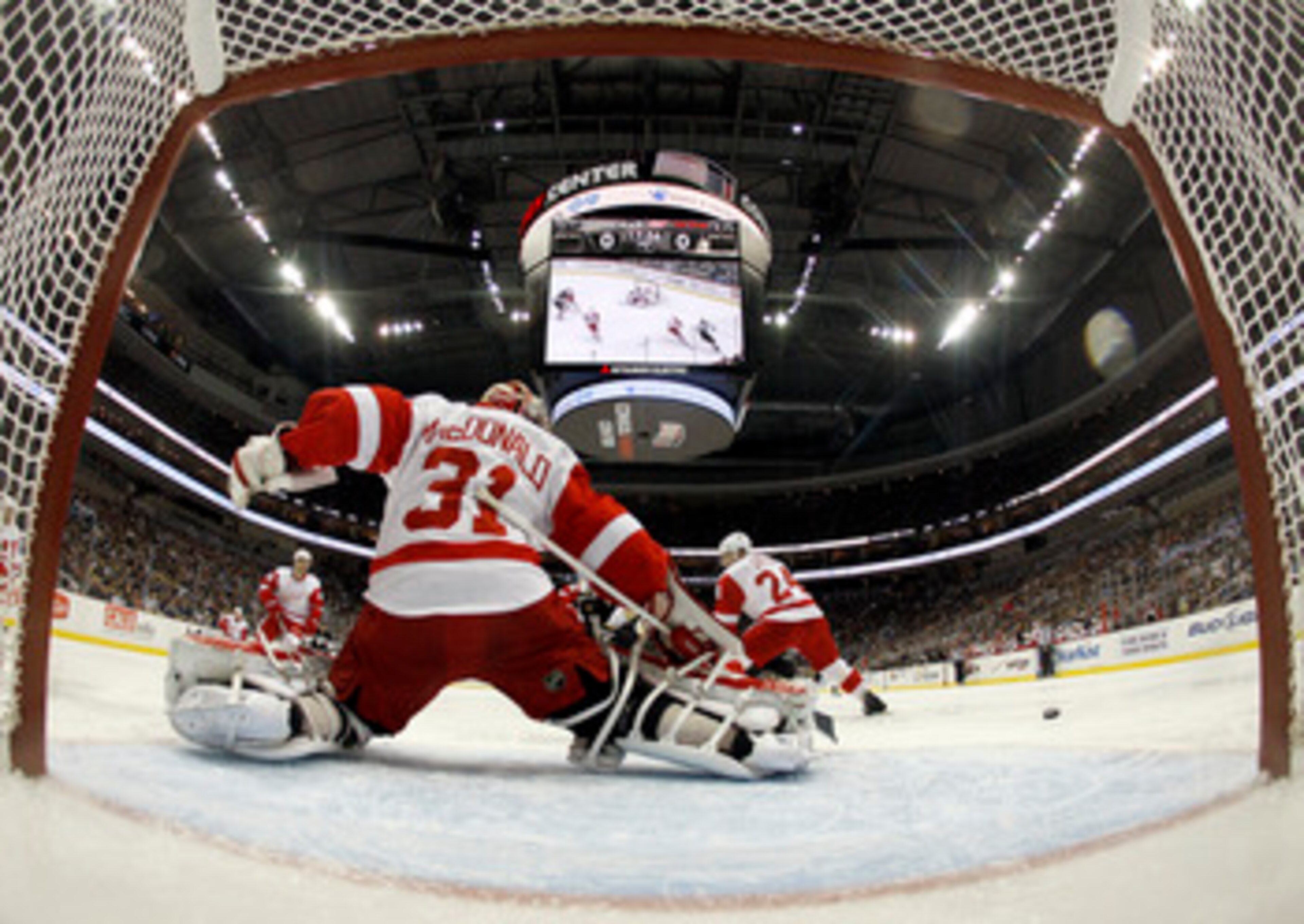 PITTSBURGH, PA - JANUARY 18:  Joey MacDonald #31 of the Detroit Red Wings makes a kick save against the Pittsburgh Penguins at Consol Energy Center on January 18, 2011 in Pittsburgh, Pennsylvania.  (Photo by Justin K. Aller/Getty Images)