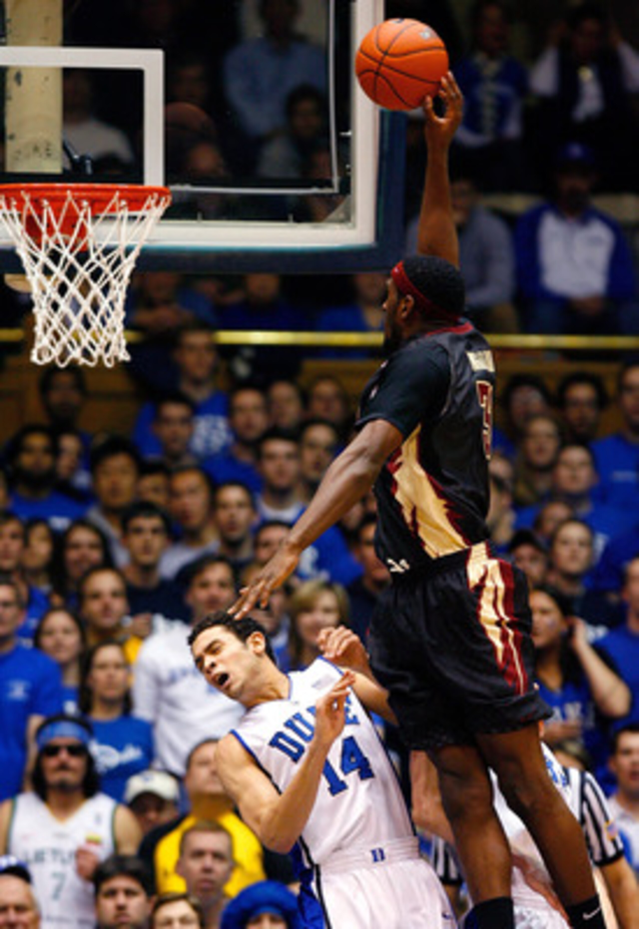 DURHAM, NC - MARCH 03: David McClure #14 of the Duke Blue Devils draws an offensive foul from Chris Singleton #31 of the Florida State Seminoles during the game on March 3, 2009 at Cameron Indoor Stadium in Durham, North Carolina. (Photo by Kevin C. Cox DURHAM, NC - MARCH 03: David McClure #14 of the Duke Blue Devils draws an offensive foul from Chris Singleton #31 of the Florida State Seminoles during the game on March 3, 2009 at Cameron Indoor Stadium in Durham, North Carolina. (Photo by Kevin C. Cox