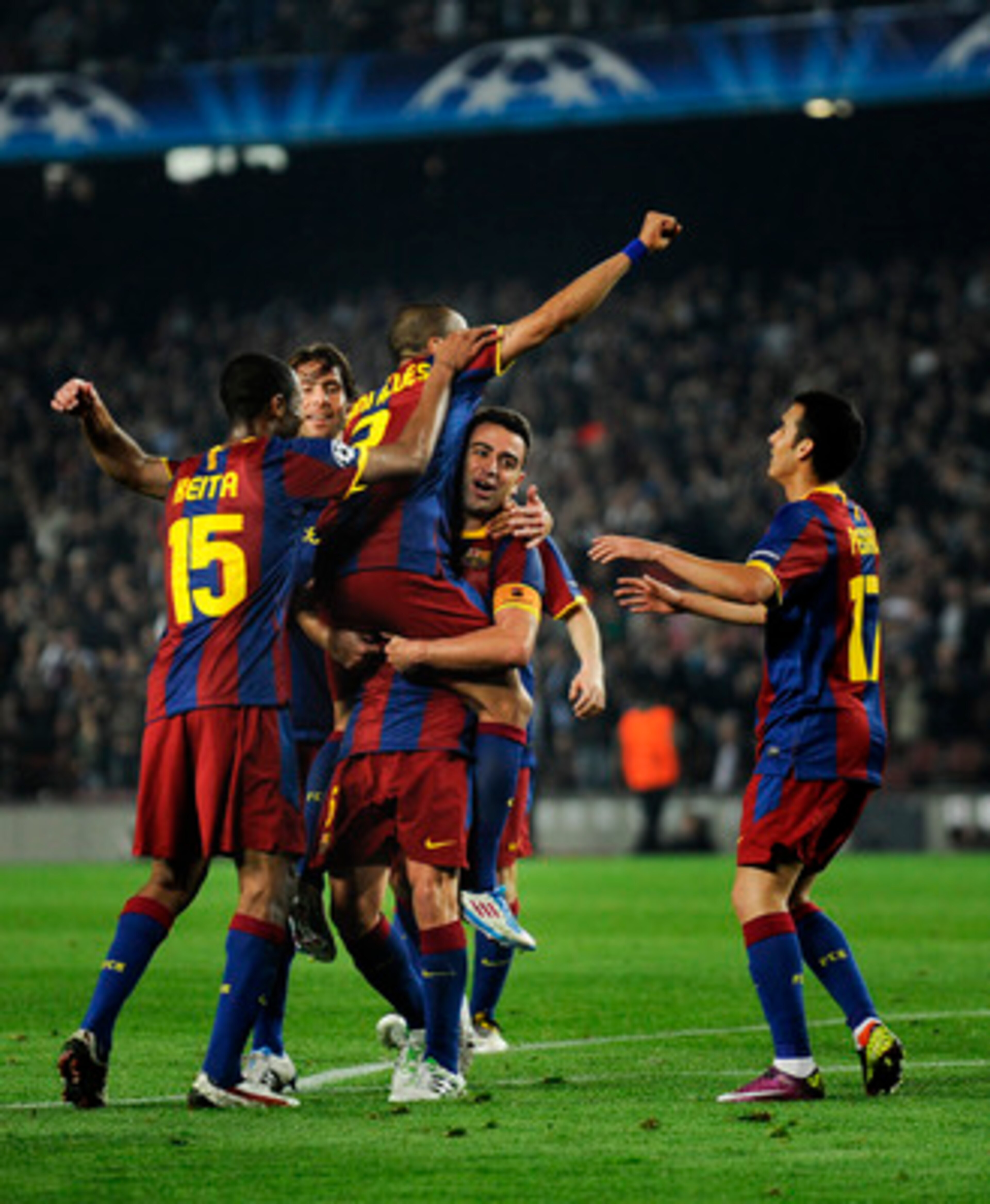 BARCELONA, SPAIN - APRIL 06:  Xavi Hernandez of FC Barcelona (C) celebrates with his teammates after scoring his team's fifth goal during the UEFA Champions League quarter final first leg match between Barcelona and Shakhtar Donetsk at the Camp Nou Stadiu