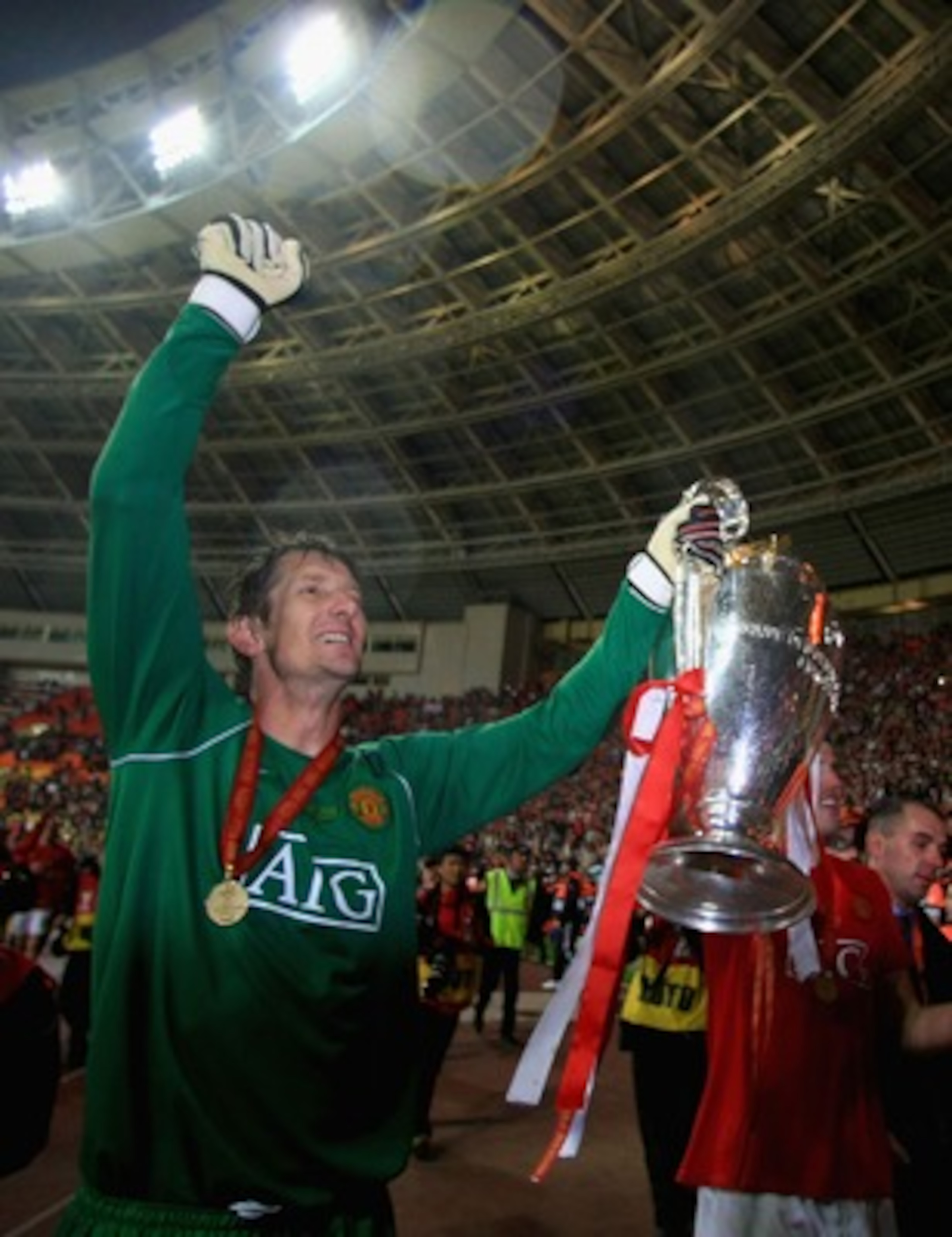 MOSCOW - MAY 21:  Edwin Van der Sar of Manchester United celebrates with the trophy following his team's victory during the UEFA Champions League Final match between Manchester United and Chelsea at the Luzhniki Stadium on May 21, 2008 in Moscow, Russia.