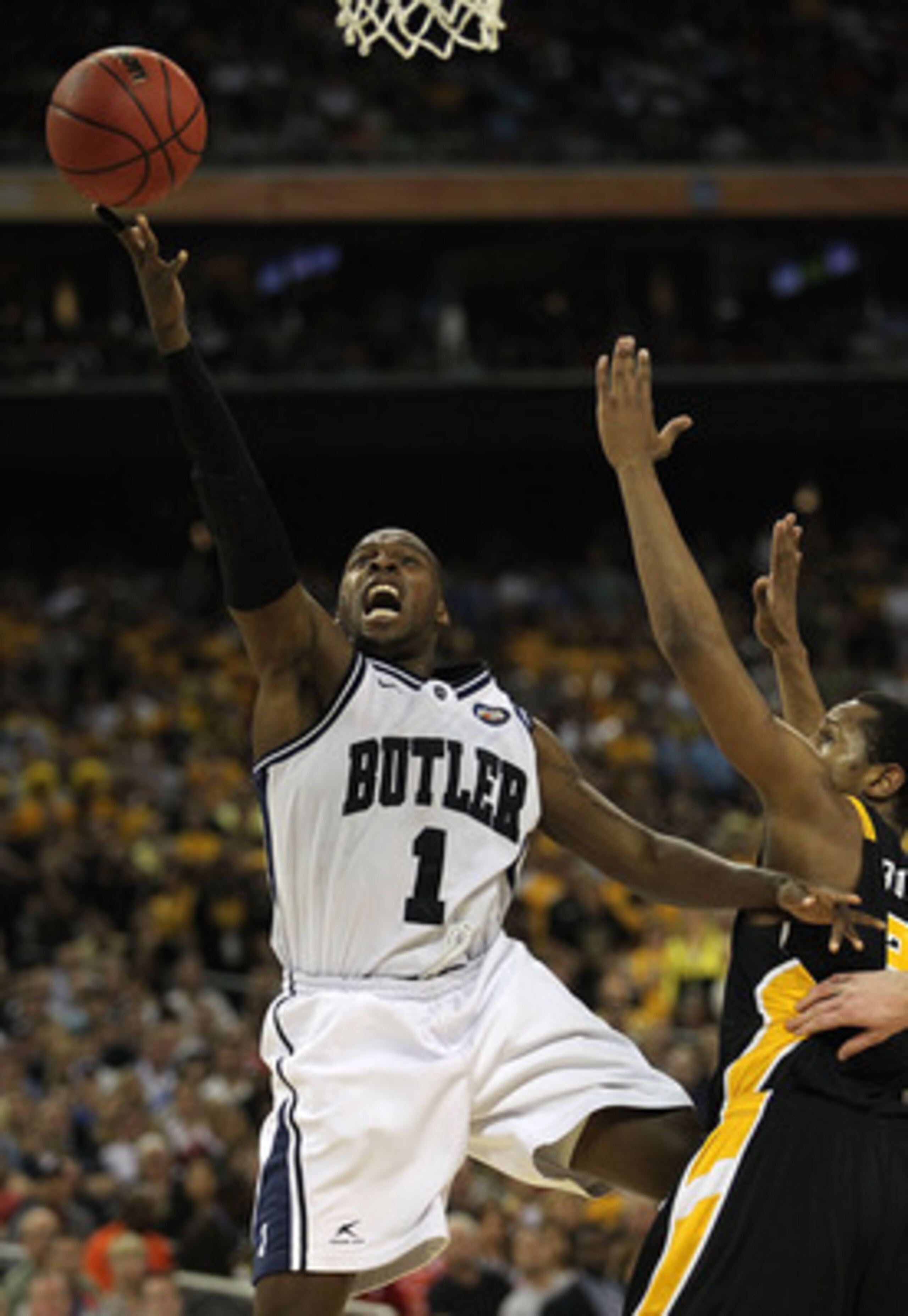 HOUSTON, TX - APRIL 02: Shelvin Mack #1 of the Butler Bulldogs goes to the hoop against Virginia Commonwealth Rams during the National Semifinal game of the 2011 NCAA Division I Men's Basketball Championship at Reliant Stadium on April 2, 2011 in Houston HOUSTON, TX - APRIL 02: Shelvin Mack #1 of the Butler Bulldogs goes to the hoop against Virginia Commonwealth Rams during the National Semifinal game of the 2011 NCAA Division I Men's Basketball Championship at Reliant Stadium on April 2, 2011 in Houston