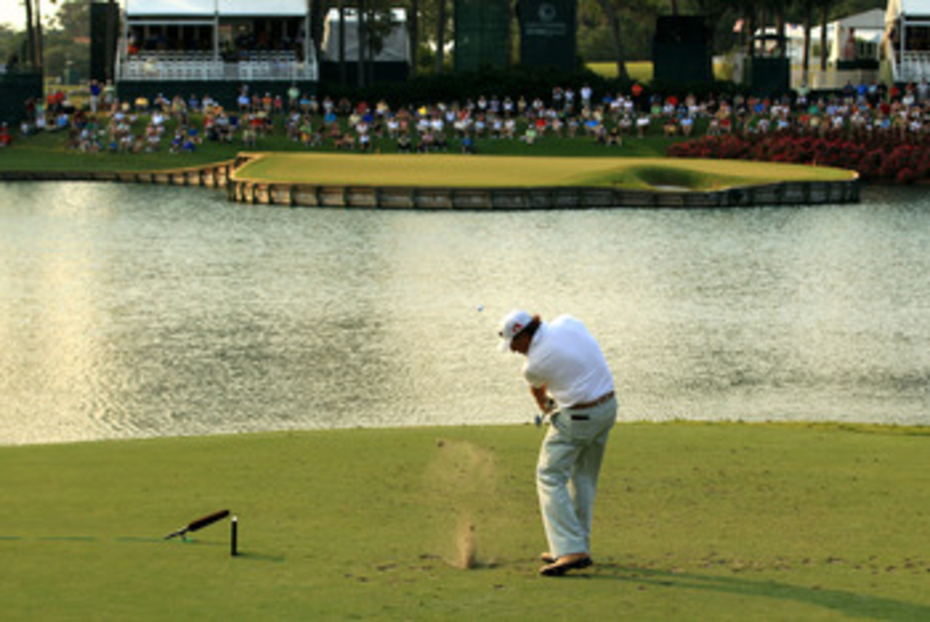 PONTE VEDRA BEACH, FL - MAY 12: Phil Mickelson hits his tee shot on the 17th hole during the first round of THE PLAYERS Championship held at THE PLAYERS Stadium course at TPC Sawgrass on May 12, 2011 in Ponte Vedra Beach, Florida. (Photo by Streeter Lec PONTE VEDRA BEACH, FL - MAY 12: Phil Mickelson hits his tee shot on the 17th hole during the first round of THE PLAYERS Championship held at THE PLAYERS Stadium course at TPC Sawgrass on May 12, 2011 in Ponte Vedra Beach, Florida. (Photo by Streeter Lec