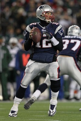 FOXBORO, MA - JANUARY 16:  Quarterback Tom Brady #12 of the New England Patriots looks to pass during their 2011 AFC divisional playoff game against the New York Jets at Gillette Stadium on January 16, 2011 in Foxboro, Massachusetts.  (Photo by Al Bello/G