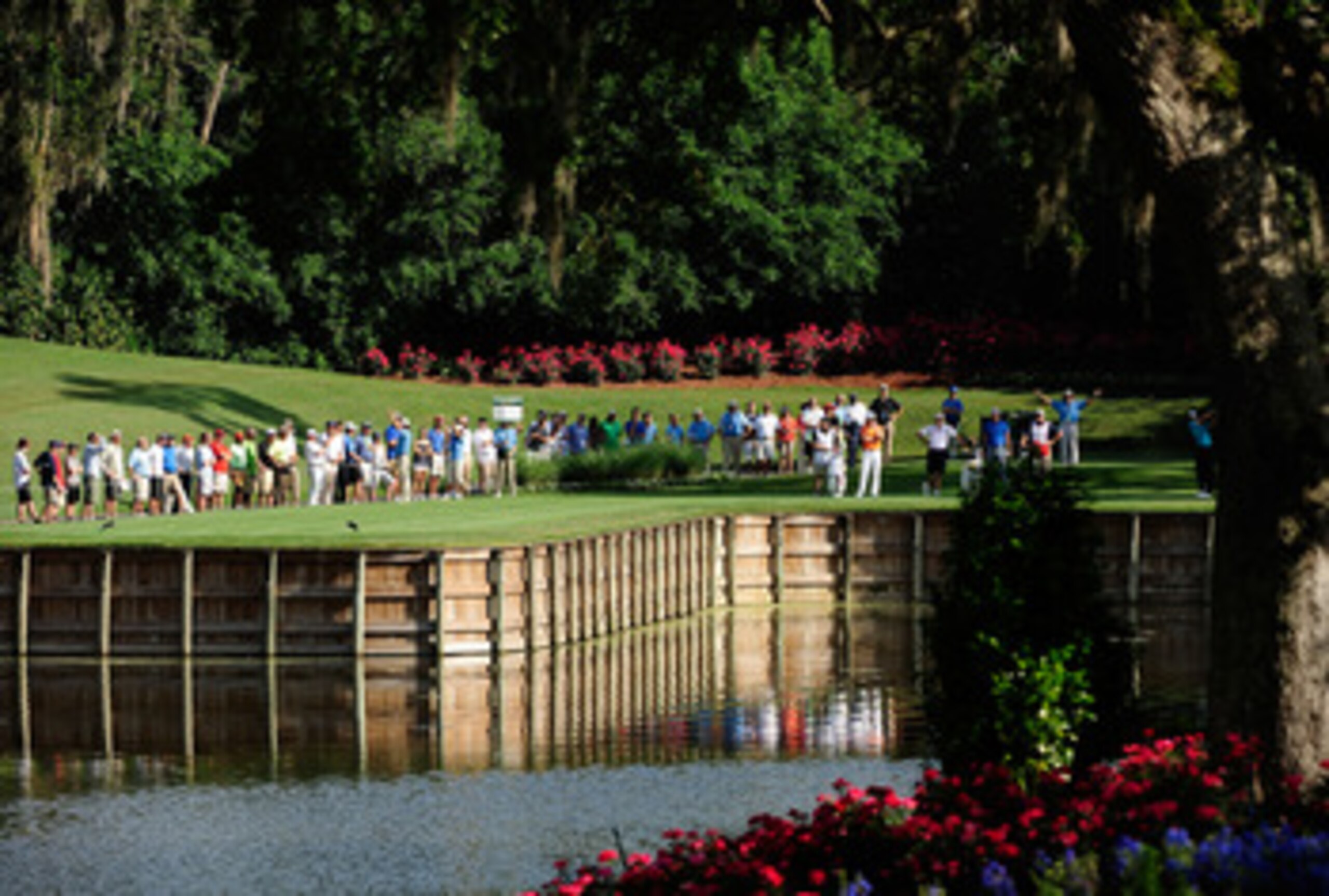 PONTE VEDRA BEACH, FL - MAY 07:  Tiger Woods hits his tee shot on the 13th hole in front of a gallery of patrons during the second round of THE PLAYERS Championship held at THE PLAYERS Stadium course at TPC Sawgrass on May 7, 2010 in Ponte Vedra Beach, Fl