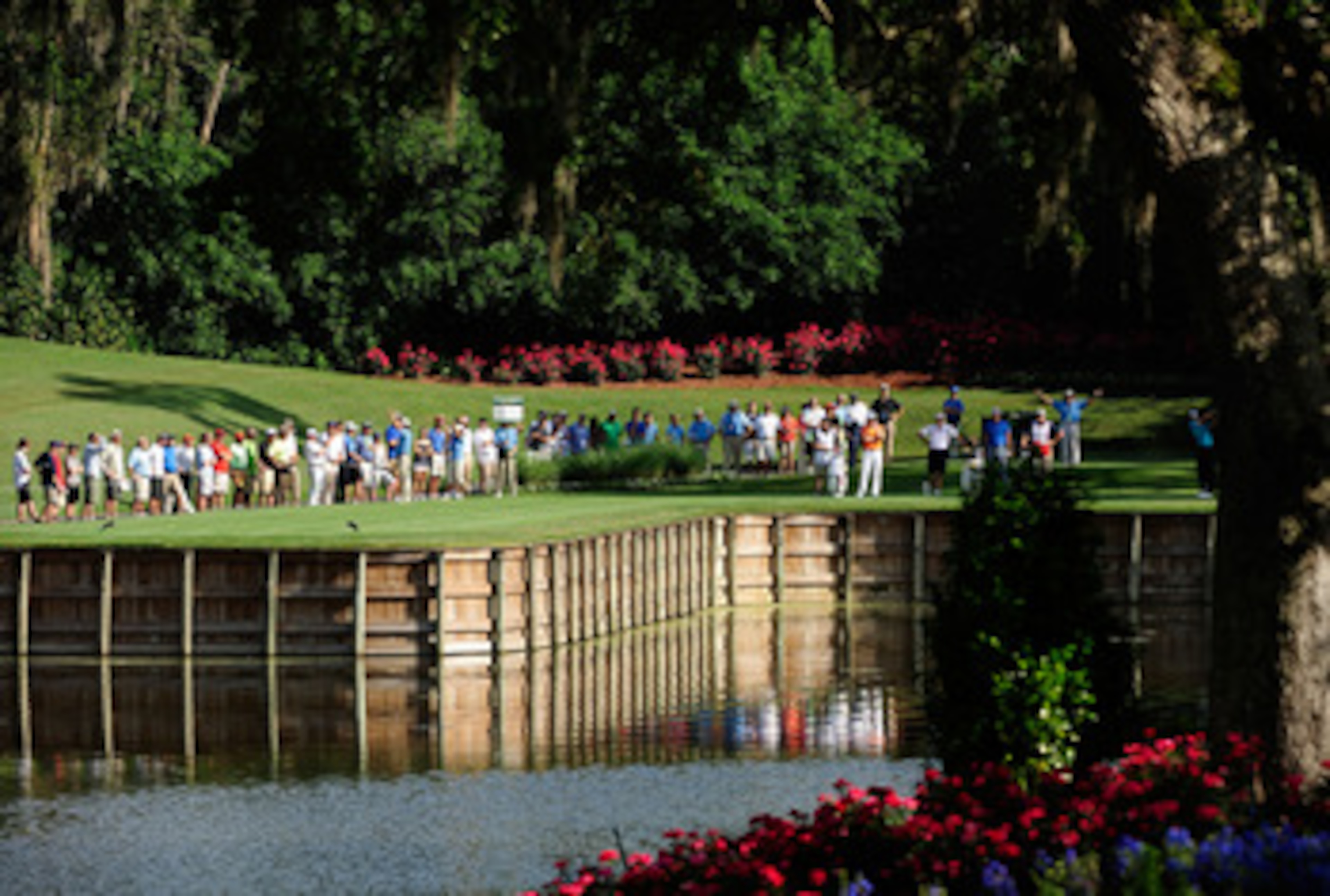 PONTE VEDRA BEACH, FL - MAY 07: Tiger Woods hits his tee shot on the 13th hole in front of a gallery of patrons during the second round of THE PLAYERS Championship held at THE PLAYERS Stadium course at TPC Sawgrass on May 7, 2010 in Ponte Vedra Beach, Fl PONTE VEDRA BEACH, FL - MAY 07: Tiger Woods hits his tee shot on the 13th hole in front of a gallery of patrons during the second round of THE PLAYERS Championship held at THE PLAYERS Stadium course at TPC Sawgrass on May 7, 2010 in Ponte Vedra Beach, Fl