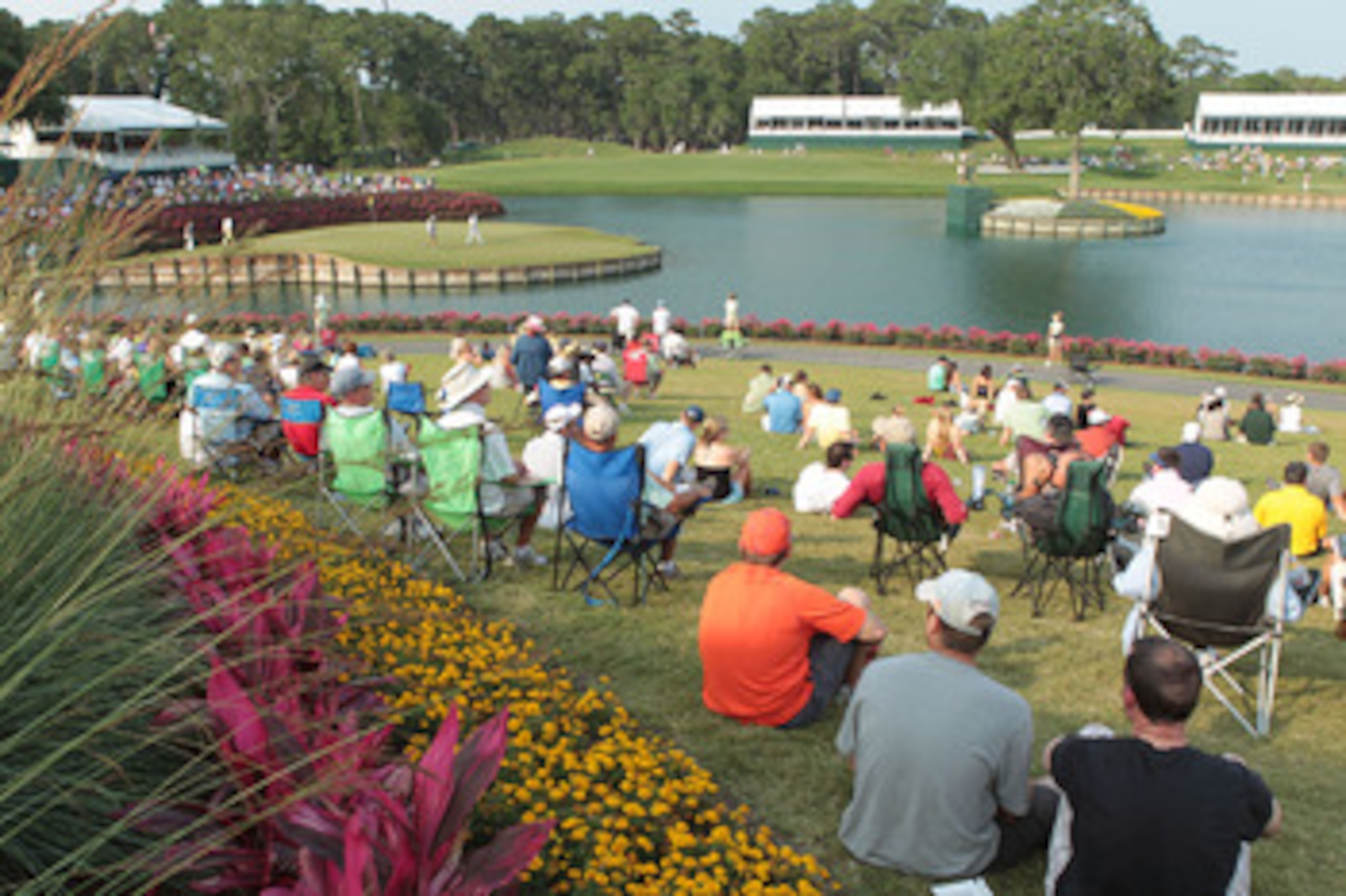 PONTE VEDRA BEACH, FL - MAY 13: Golf fans watch the play on the 17th hole during the second round of THE PLAYERS Championship held at THE PLAYERS Stadium course at TPC Sawgrass on May 13, 2011 in Ponte Vedra Beach, Florida. (Photo by Scott Halleran/Gett PONTE VEDRA BEACH, FL - MAY 13: Golf fans watch the play on the 17th hole during the second round of THE PLAYERS Championship held at THE PLAYERS Stadium course at TPC Sawgrass on May 13, 2011 in Ponte Vedra Beach, Florida. (Photo by Scott Halleran/Gett