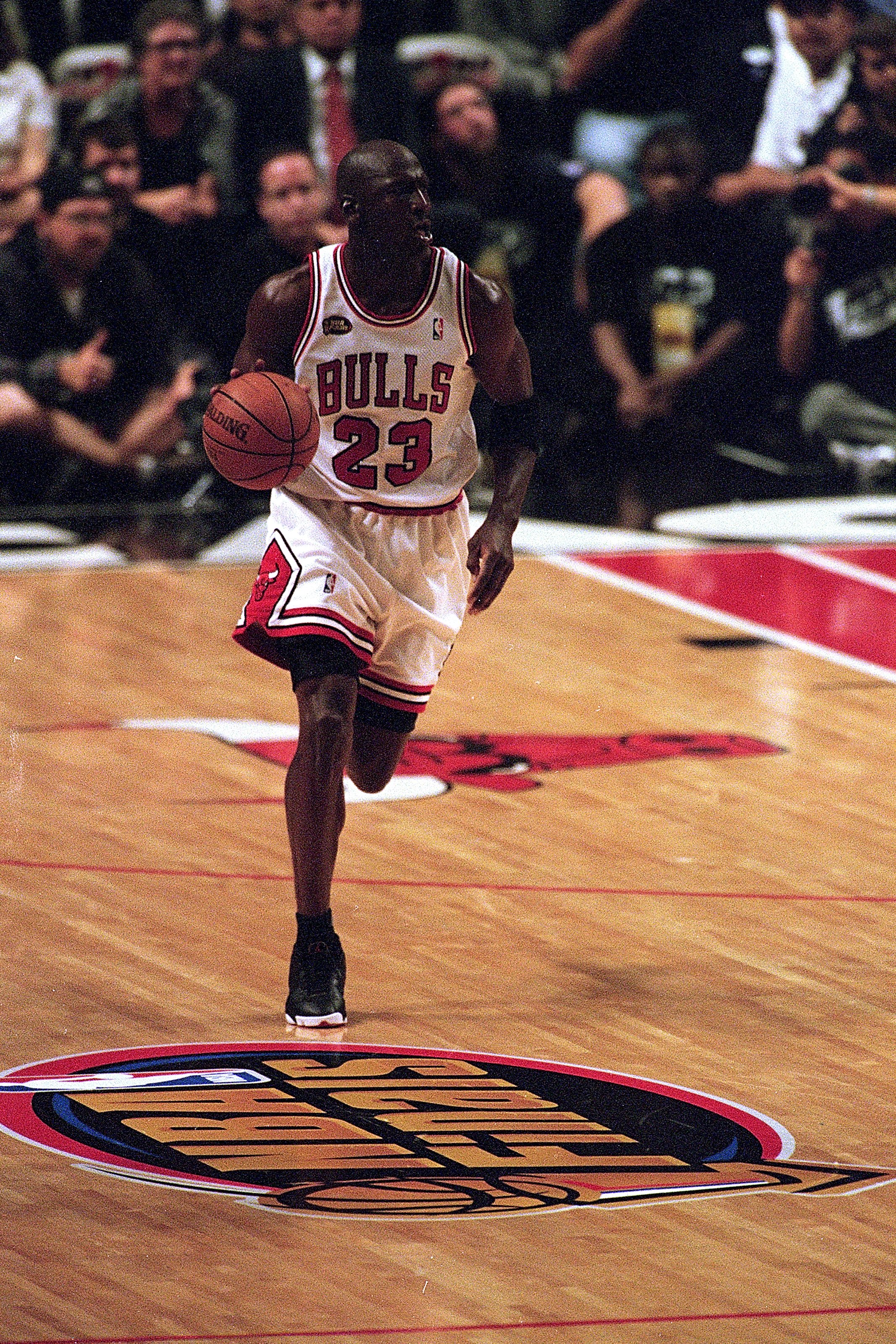12 Jun 1998:  Michael Jordan #23 of the Chicago Bulls dribbles the ball down the court during the NBA Final game against the Utah Jazz at the United Center in Chicago, Illinois. The Bulls defeated the jazz 81-33. .  Mandatory Credit: Jonathan Daniel  /All