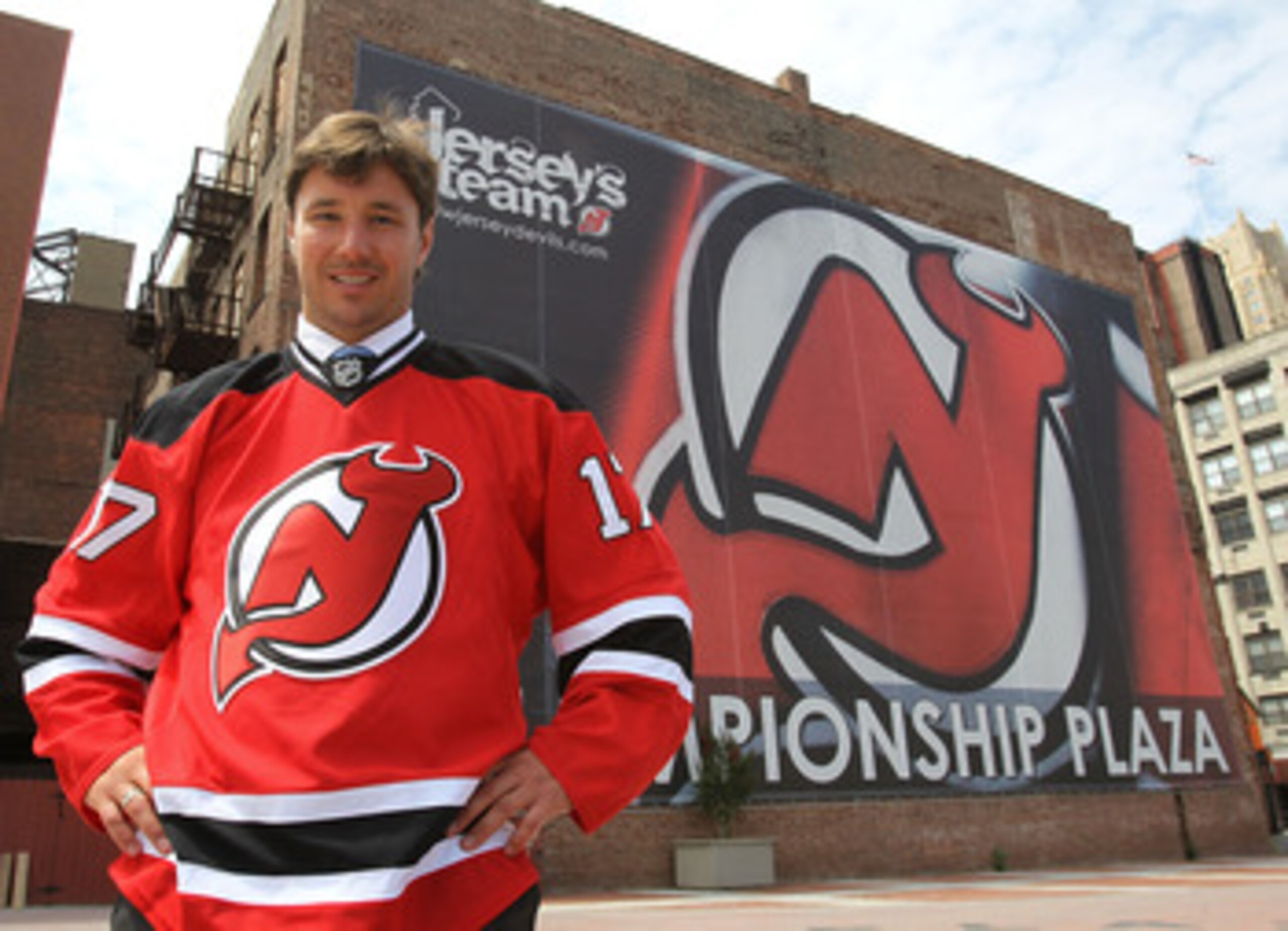 NEWARK, NJ - JULY 20:  Ilya Kovalchuk of the New Jersey Devils poses for photographs following the media opportunity announcing his contract renewal at the Prudential Center on July 20, 2010 in Newark, New Jersey.  (Photo by Bruce Bennett/Getty Images)