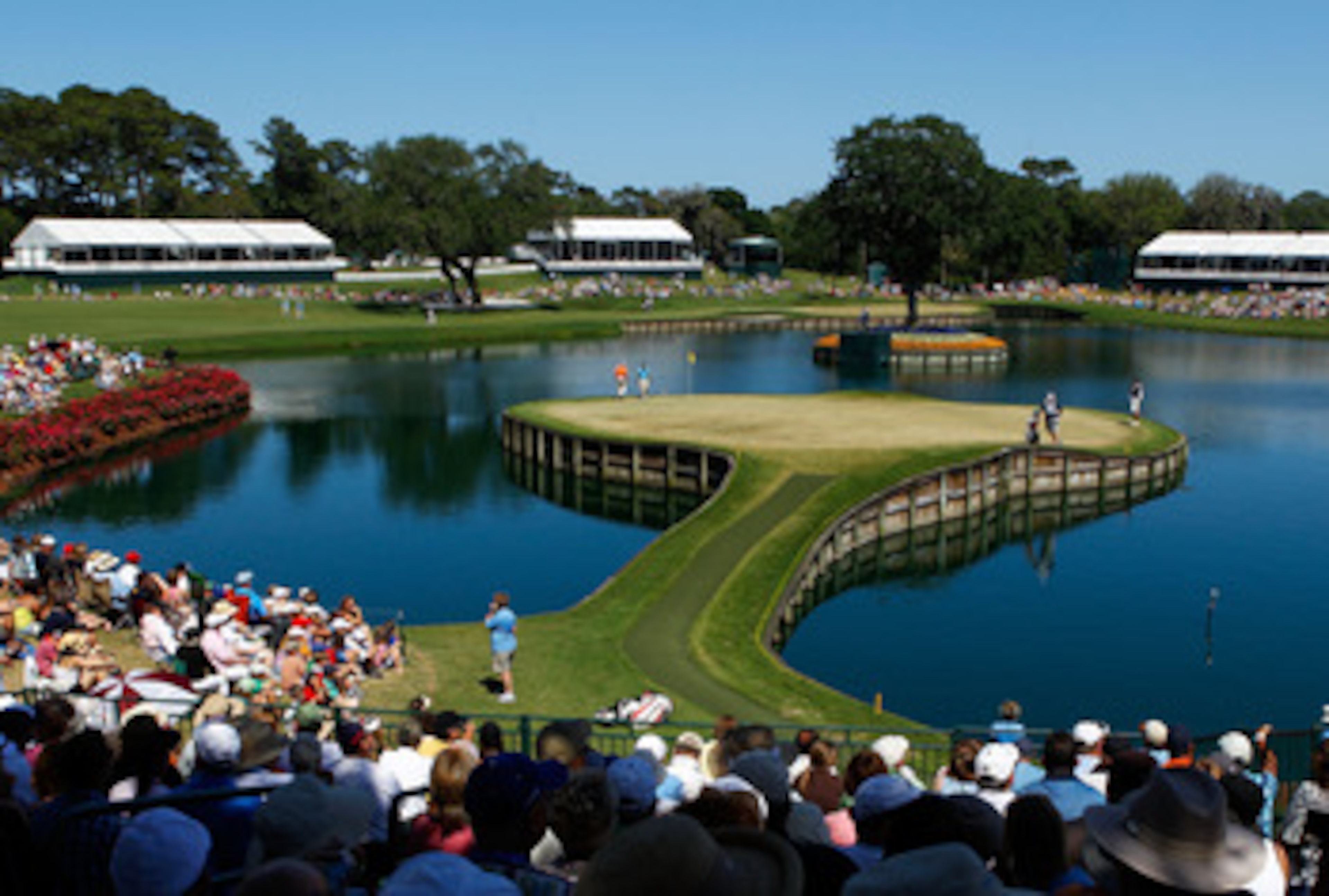 PONTE VEDRA BEACH, FL - MAY 09: Patrons watch play on the 17th green during the final round of THE PLAYERS Championship held at THE PLAYERS Stadium course at TPC Sawgrass on May 9, 2010 in Ponte Vedra Beach, Florida. (Photo by Scott Halleran/Getty Image PONTE VEDRA BEACH, FL - MAY 09: Patrons watch play on the 17th green during the final round of THE PLAYERS Championship held at THE PLAYERS Stadium course at TPC Sawgrass on May 9, 2010 in Ponte Vedra Beach, Florida. (Photo by Scott Halleran/Getty Image