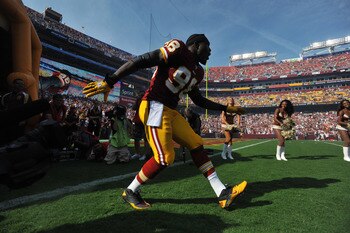 LANDOVER - SEPTEMBER 19:  Brian Orakpo #98 of the Washington Redskins is introduced before the game against the Houston Texans at FedExField on September 19, 2010 in Landover, Maryland. The Texans defeated the Redskins in overtime 30-27. (Photo by Larry F