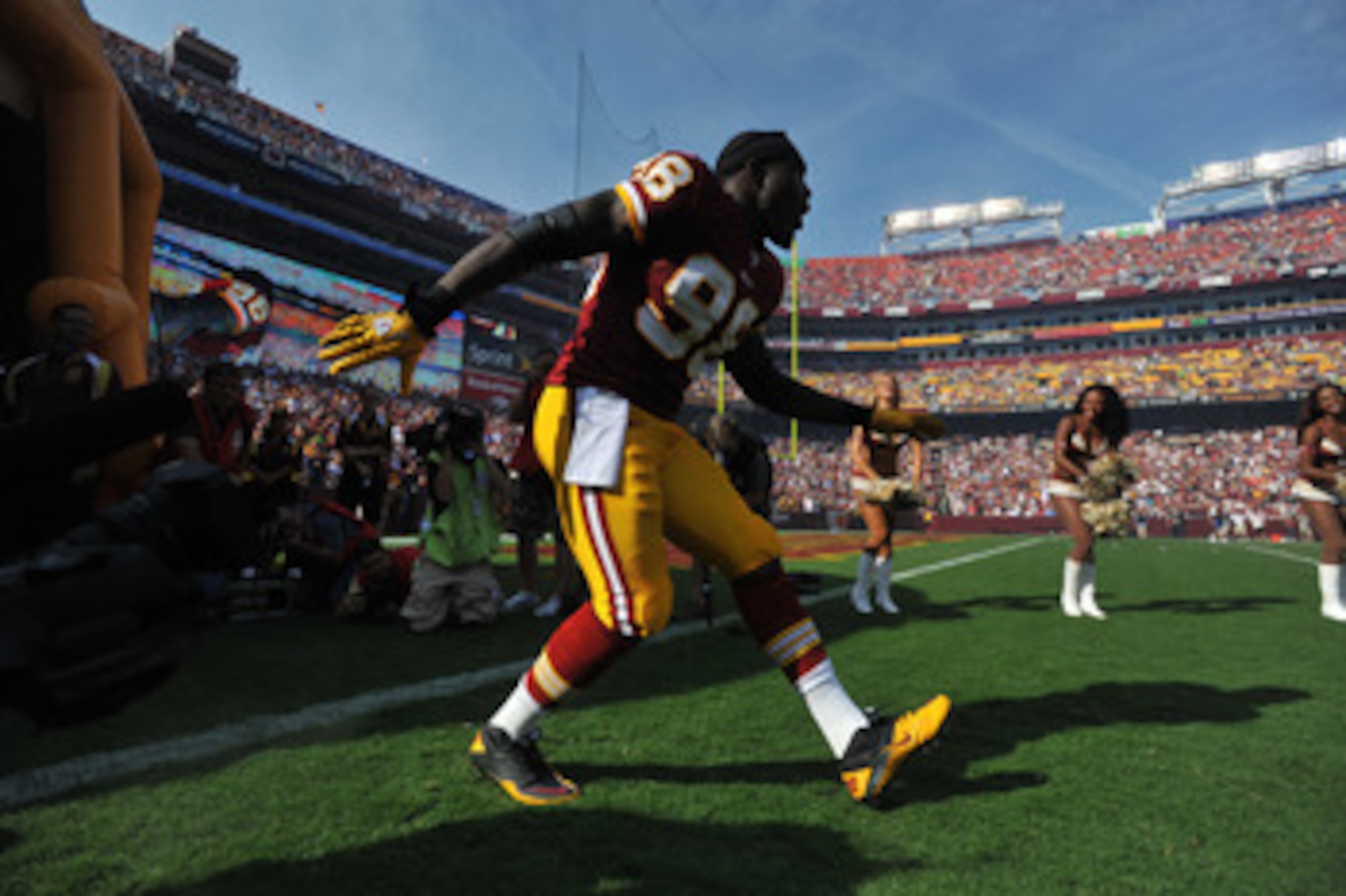 LANDOVER - SEPTEMBER 19:  Brian Orakpo #98 of the Washington Redskins is introduced before the game against the Houston Texans at FedExField on September 19, 2010 in Landover, Maryland. The Texans defeated the Redskins in overtime 30-27. (Photo by Larry F