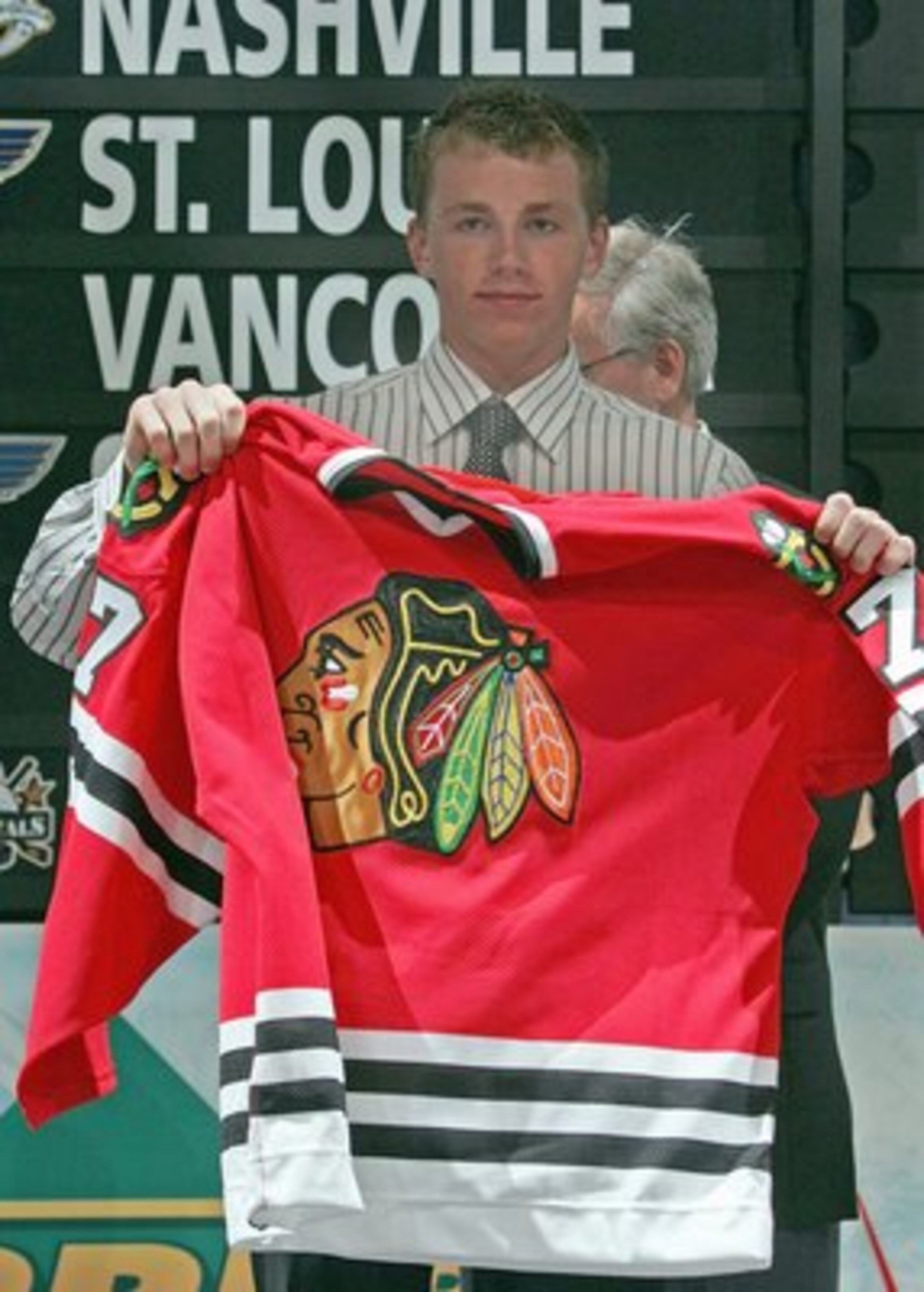COLUMBUS, OH - JUNE 22:  2007 NHL Entry Draft first overall pick Patrick Kane holds up the Chicago Blackhawks jersey from draft the stage during the first round of the 2007 NHL Entry Draft at Nationwide Arena on June 22, 2007 in Columbus, Ohio. (Photo by 