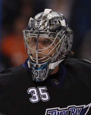 TAMPA, FL - MAY 04: Dwayne Roloson #35 of the Tampa Bay Lightning skates against the Washington Capitals in Game Four of the Eastern Conference Semifinals during the 2011 NHL Stanley Cup Playoffs at the St Pete Times Forum on May 4, 2011 in Tampa, Florida