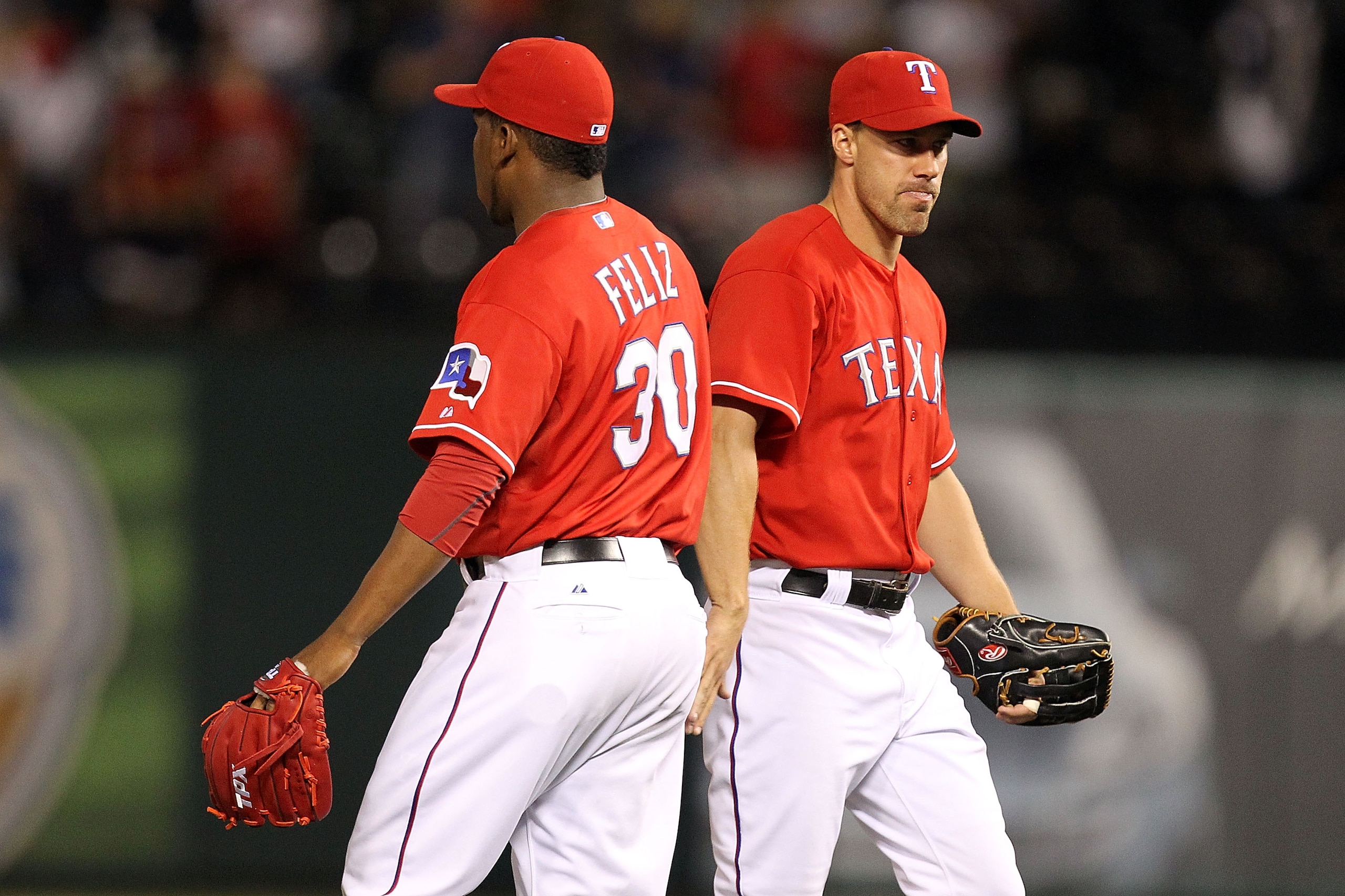 ARLINGTON, TX - MAY 07:  Pitcher Neftali Feliz #30 of the Texas Rangers and David Murphy #7 celebrate a 7-5 win against the New York Yankees at Rangers Ballpark in Arlington on May 7, 2011 in Arlington, Texas.  (Photo by Ronald Martinez/Getty Images)