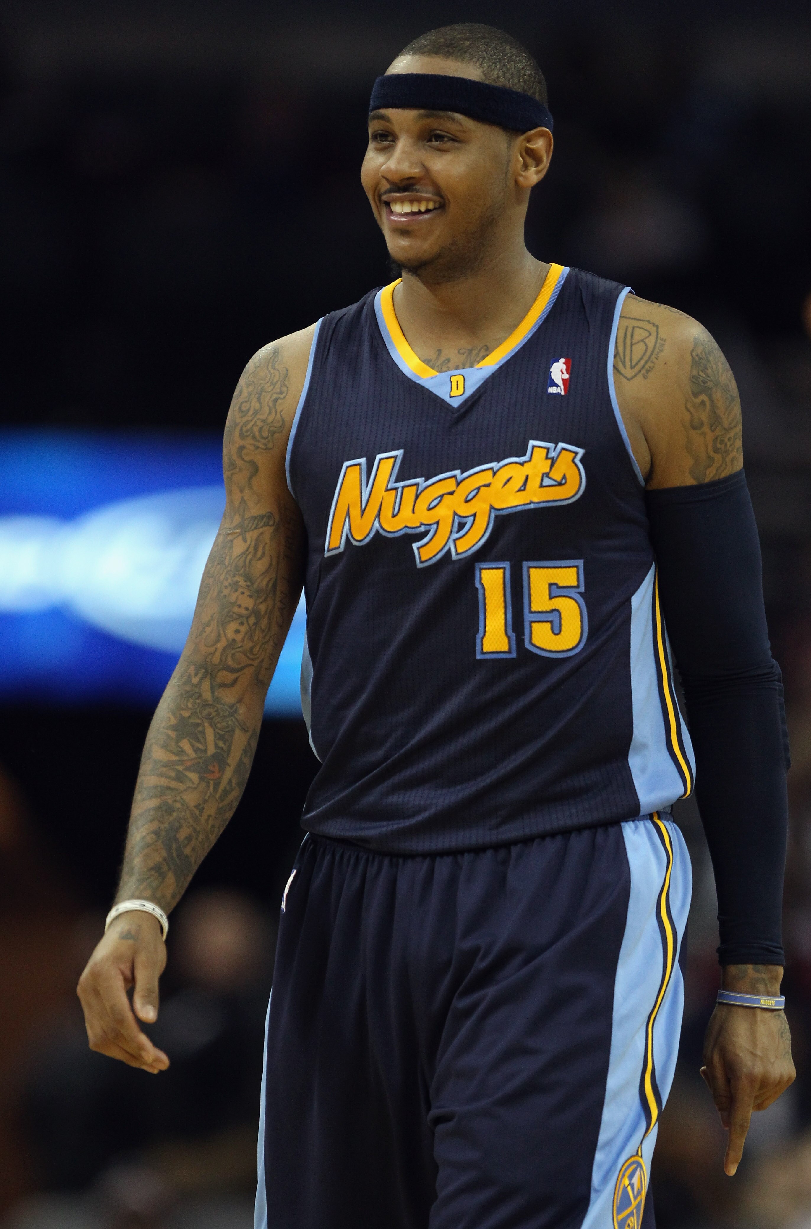 CHARLOTTE, NC - DECEMBER 07:  Carmelo Anthony #15 of the Denver Nuggets watches on against the Charlotte Bobcats during their game at Time Warner Cable Arena on December 7, 2010 in Charlotte, North Carolina.  NOTE TO USER: User expressly acknowledges and
