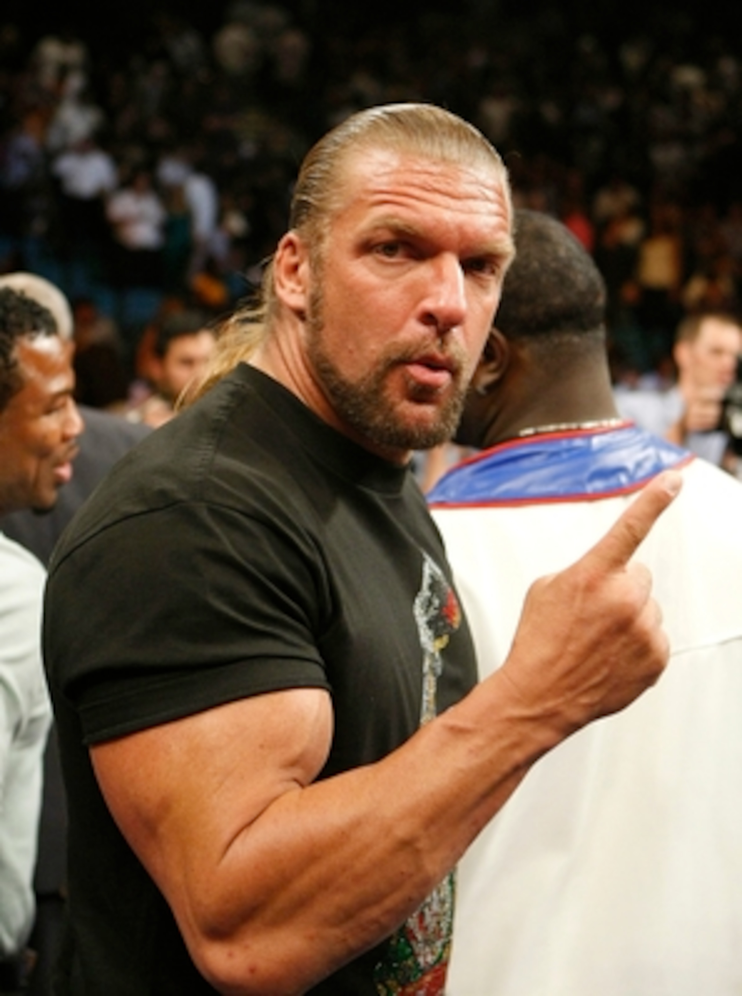 LAS VEGAS - SEPTEMBER 19:  WWE wrestler Triple H poses in the ring after the Floyd Mayweather Jr. and Juan Manuel Marquez of Mexico welterweight bout at the MGM Grand Garden Arena September 19, 2009 in Las Vegas, Nevada. (Photo by Ethan Miller/Getty Image
