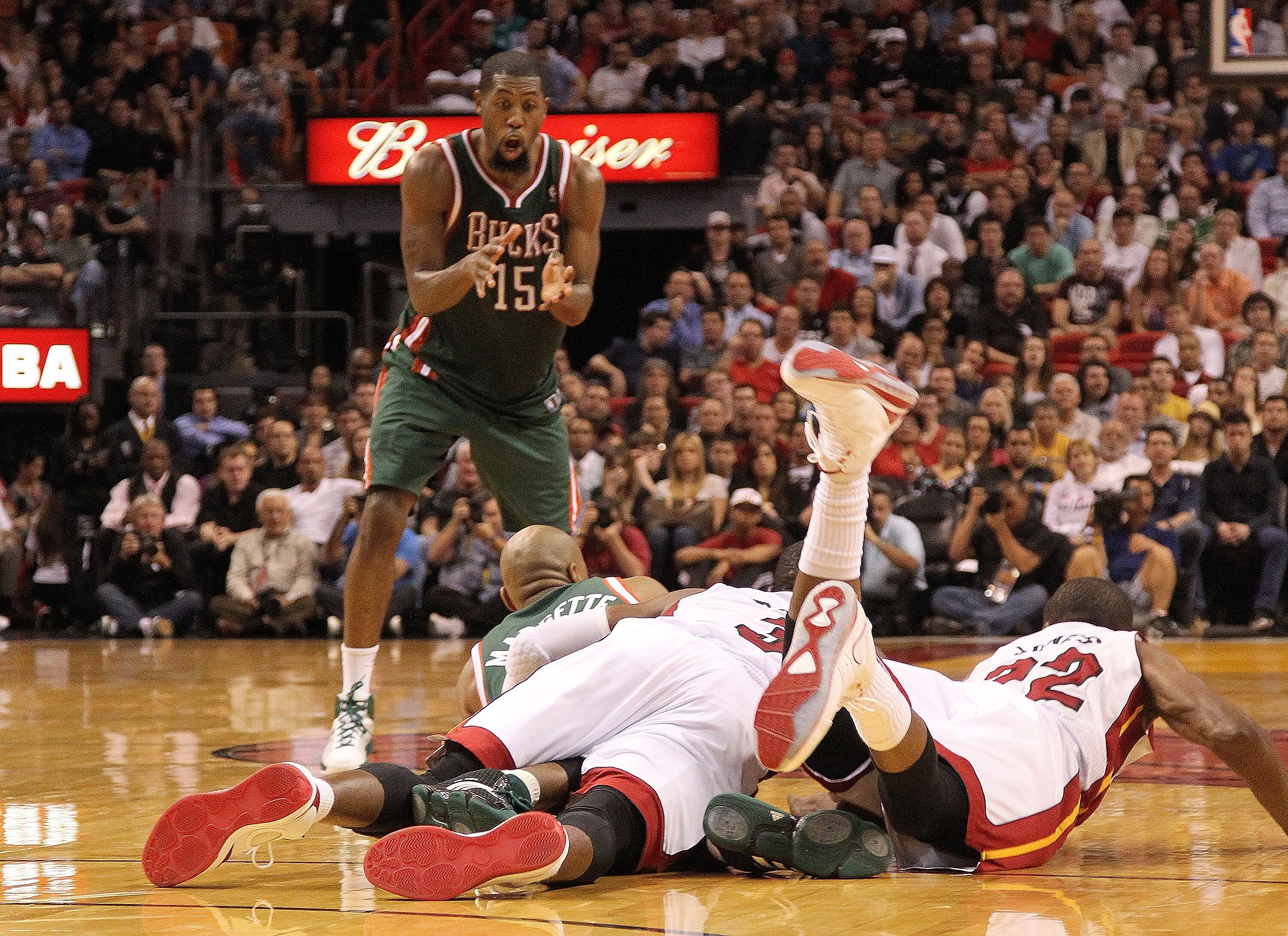 MIAMI, FL - JANUARY 04:  John Salmons #15 of the Milwaukee Bucks calls for the ball during a loose ball scrum during a game against the Miami Heat at American Airlines Arena on January 4, 2011 in Miami, Florida. NOTE TO USER: User expressly acknowledges a