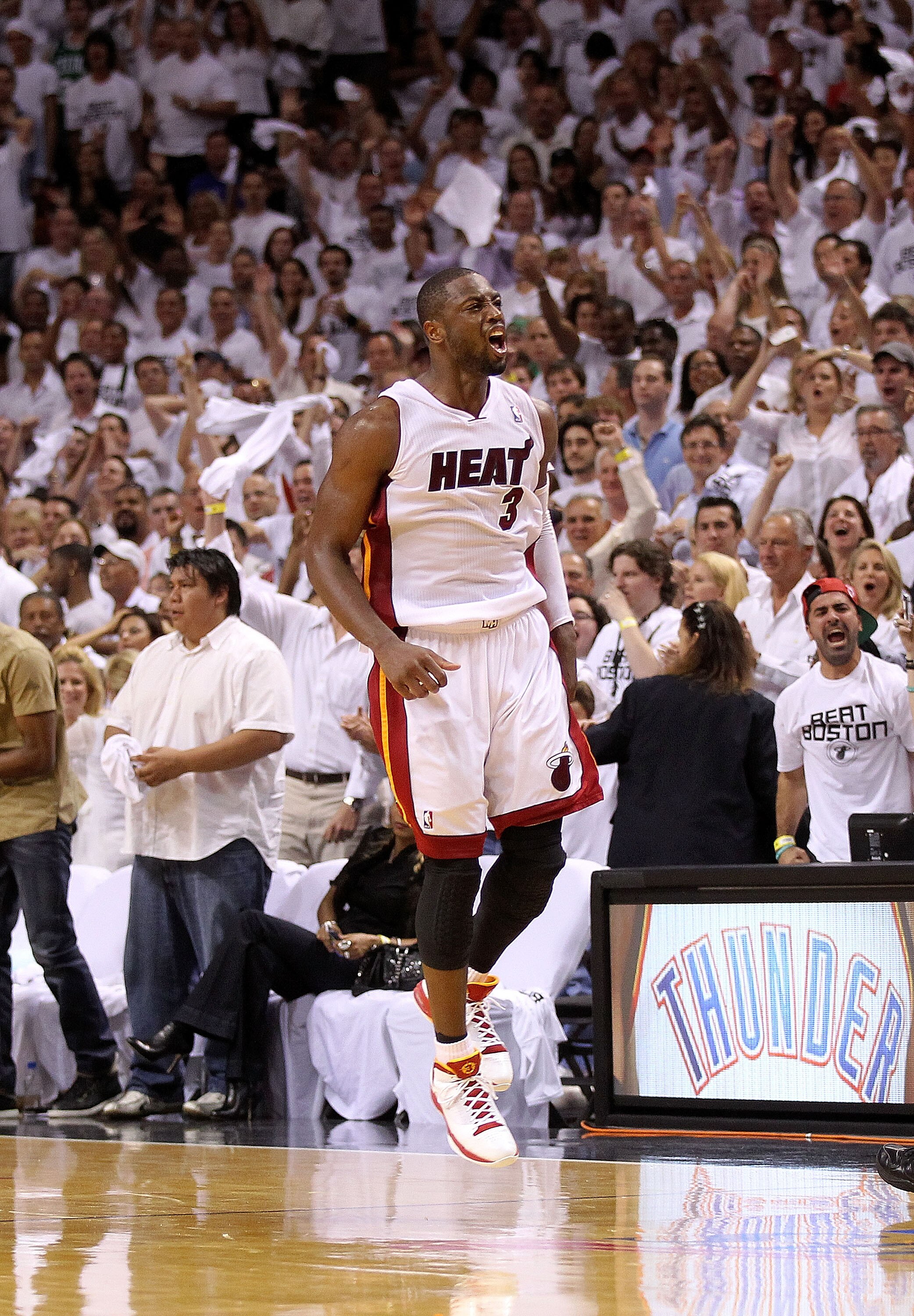MIAMI, FL - MAY 11:  Dwyane Wade #3 of the Miami Heat reacts after taking the lead during Game Five of the Eastern Conference Semifinals of the 2011 NBA Playoffs against the Boston Celtics at American Airlines Arena on May 11, 2011 in Miami, Florida. NOTE