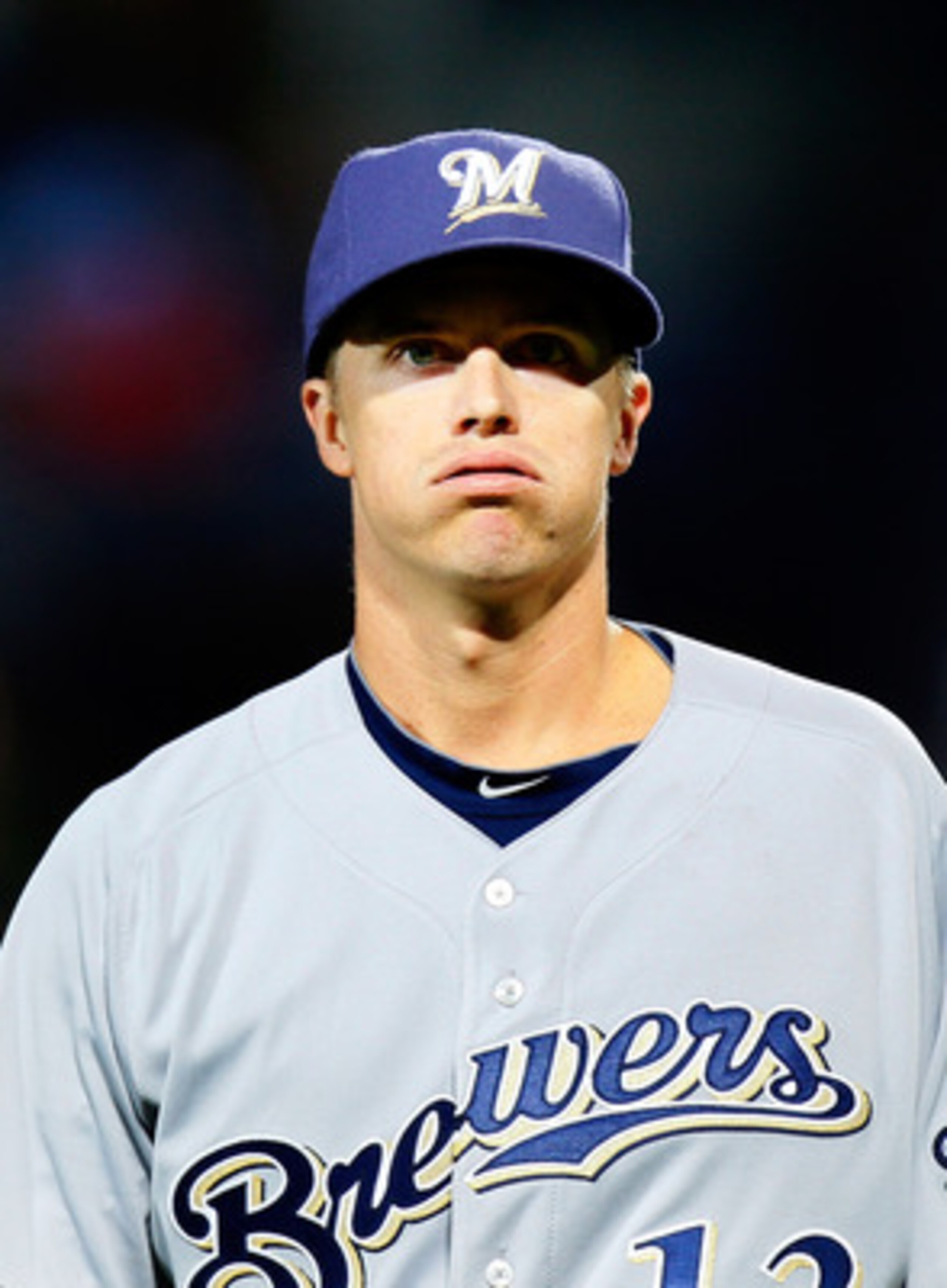 ATLANTA, GA - MAY 04:  Zack Greinke #13 of the Milwaukee Brewers walks off the field after pitching in the second inning against the Atlanta Braves at Turner Field on May 4, 2011 in Atlanta, Georgia.  (Photo by Kevin C. Cox/Getty Images)