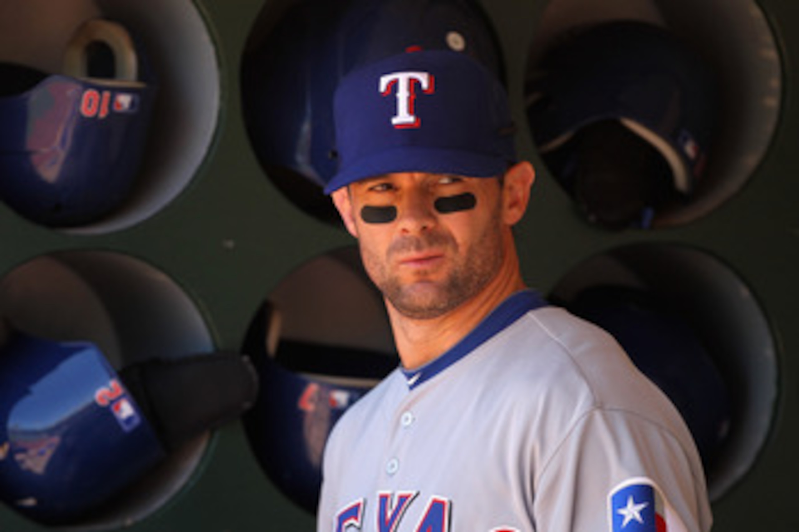 OAKLAND, CA - MAY 02:  Michael Young #10 of the Texas Rangers stands in the dugout before their game against the Oakland Athletics at Oakland-Alameda County Coliseum on May 2, 2011 in Oakland, California.  (Photo by Ezra Shaw/Getty Images)