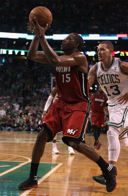 BOSTON, MA - MAY 07:  Mario Chalmers #15 of the Miami Heat heads for the basket as Delonte West #13 of the Boston Celtics defends in Game Three of the Eastern Conference Semifinals in the 2011 NBA Playoffs on May 7, 2011 at the TD Garden in Boston, Massac