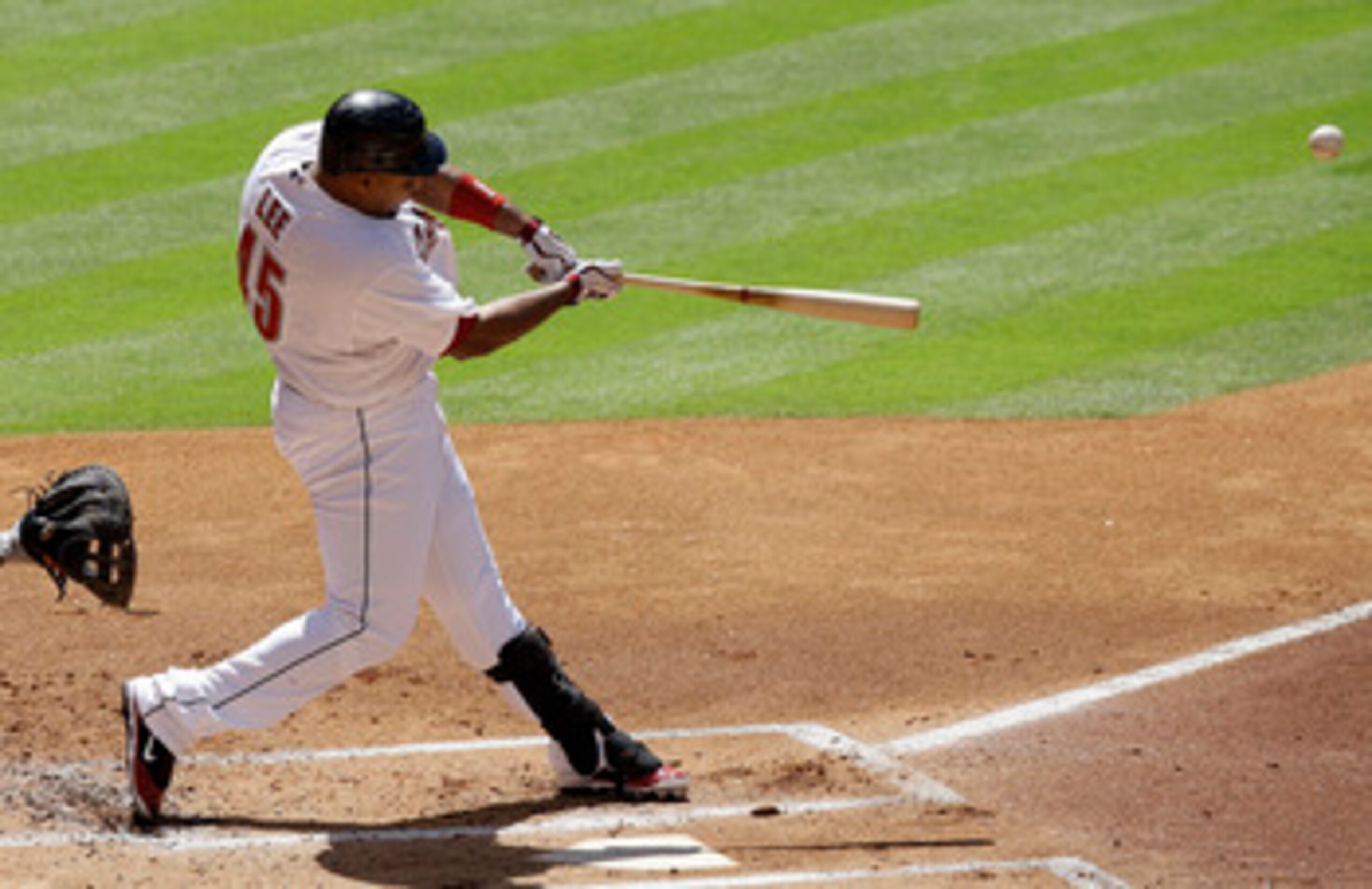 HOUSTON - MAY 14:  Carlos Lee #45 of the Houston Astros singles in the first inning for his 2000th career hit during a game against the New York Mets at Minute Maid Park on May 14, 2011 in Houston, Texas.  (Photo by Bob Levey/Getty Images)