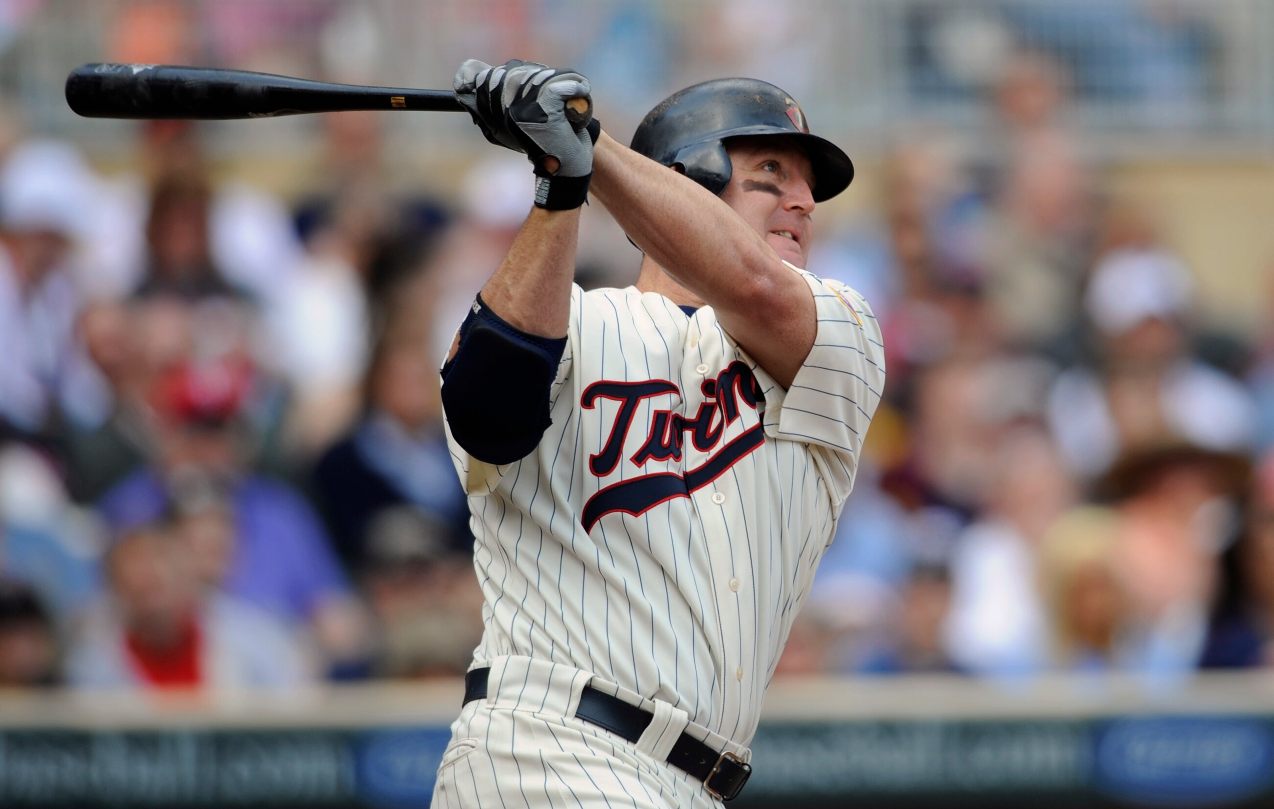 MINNEAPOLIS, MN - APRIL 24: Jim Thome #25 of the Minnesota Twins hits a double against the Cleveland Indians during the seventh inning of their game on April 24, 2011 at Target Field in Minneapolis, Minnesota. Twins defeated the Indians 4-3. (Photo by Han