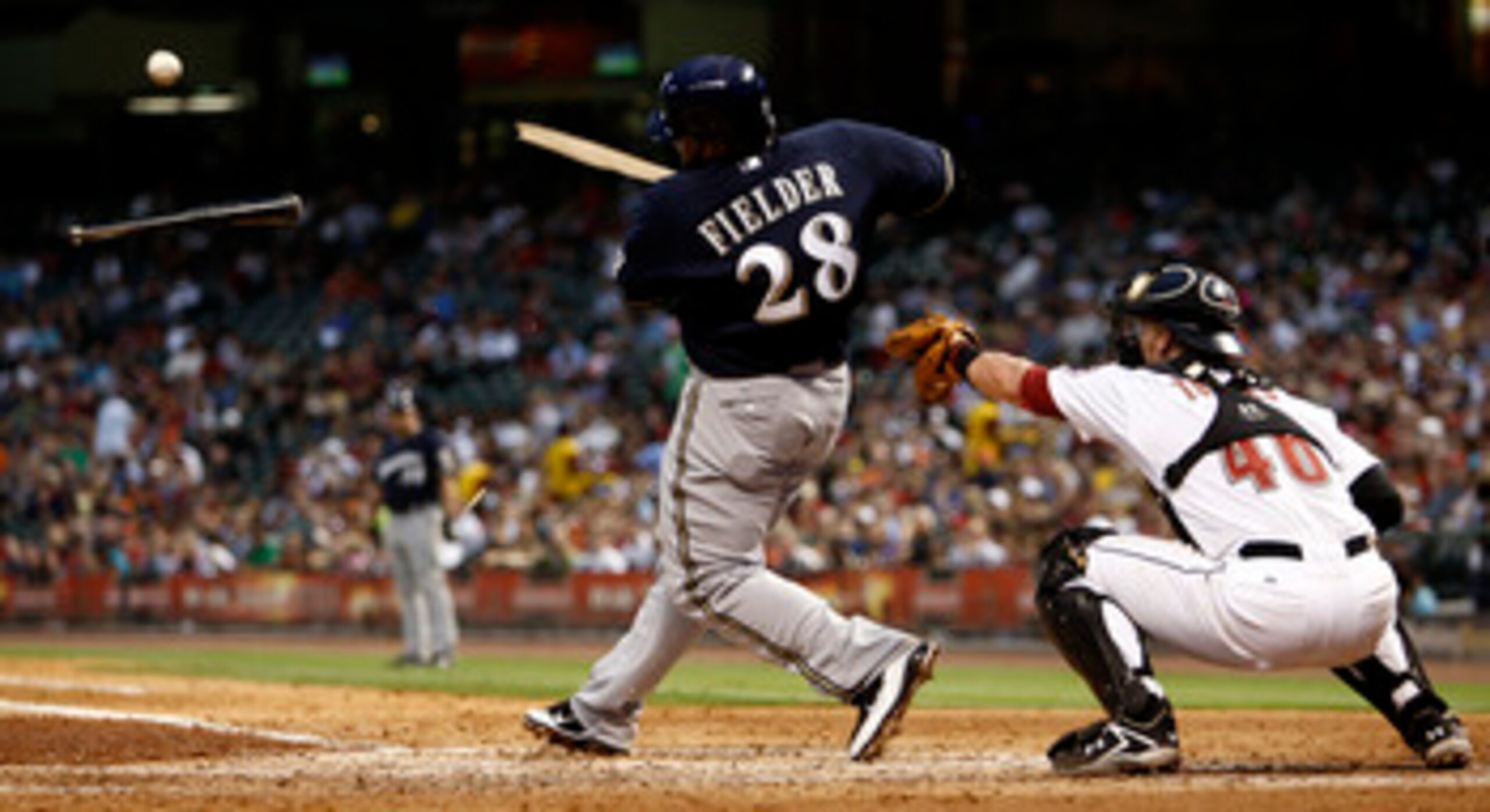 HOUSTON - APRIL 30:  Prince Fielder #28 of the Milwaukee Brewers shatters his bat in the sixth inning in front of catcher J.R. Towles #46 of the Houston Astros at Minute Maid Park on April 30, 2011 in Houston, Texas.  (Photo by Bob Levey/Getty Images)