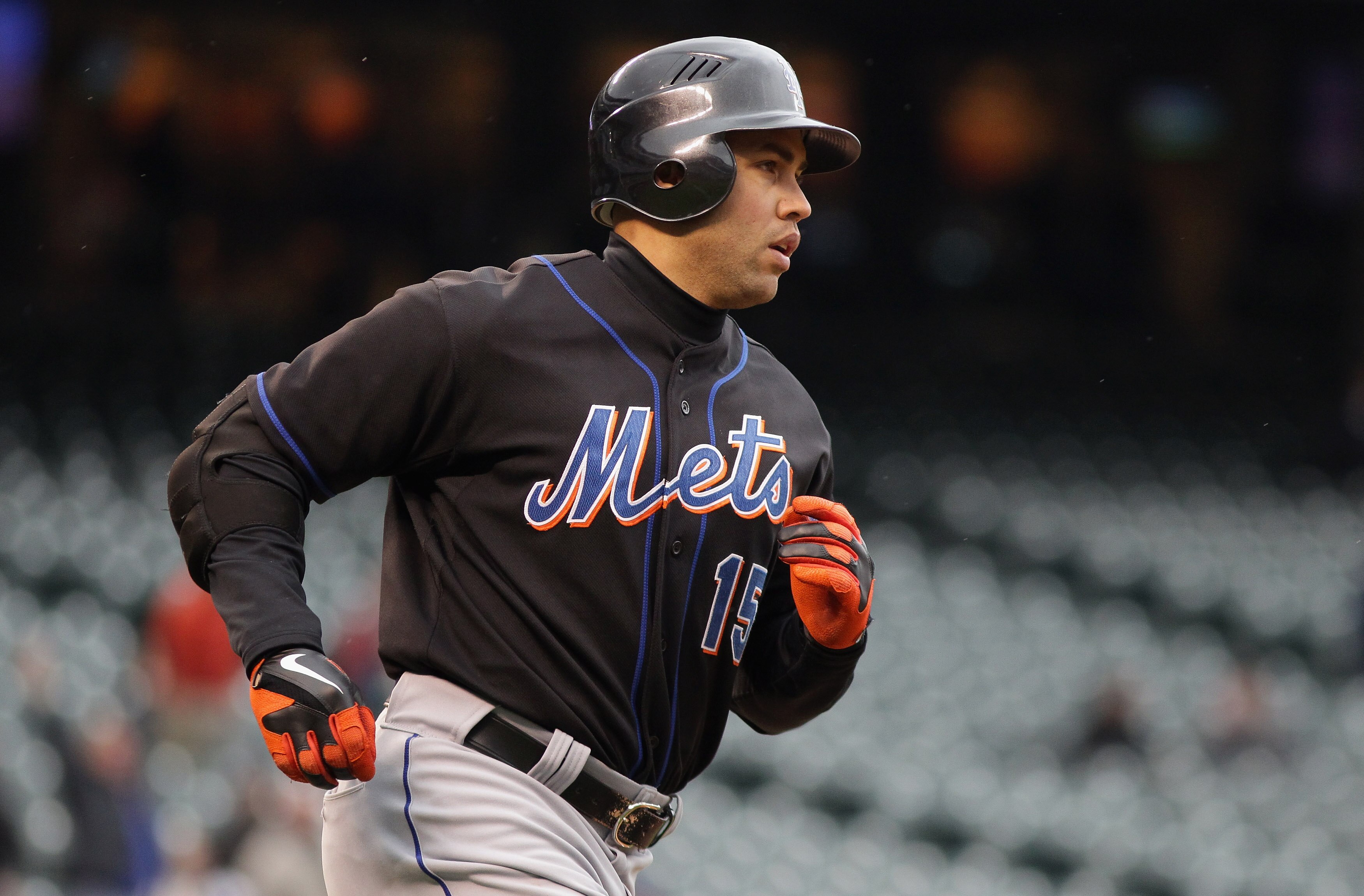 DENVER, CO - MAY 12:  Carlos Beltran #15 of the New York Mets rounds the bases on his third home run of the game off of Matt Lindstrom of the Colorado Rockies in the ninth inning at Coors Field on May 12, 2011 in Denver, Colorado. Beltran had three homeru