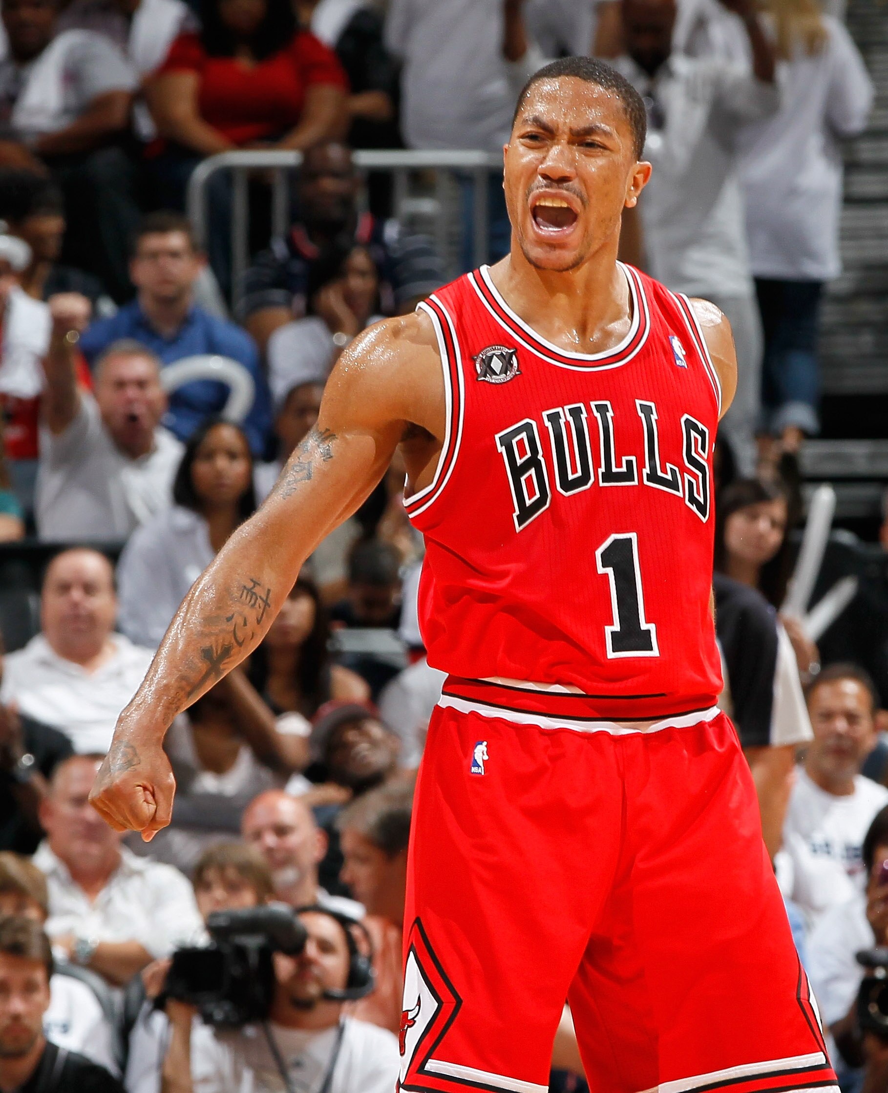 ATLANTA, GA - MAY 12:  Derrick Rose #1 of the Chicago Bulls reacts after a basket against the Atlanta Hawks in Game Six of the Eastern Conference Semifinals in the 2011 NBA Playoffs at Phillips Arena on May 12, 2011 in Atlanta, Georgia.  NOTE TO USER: Use
