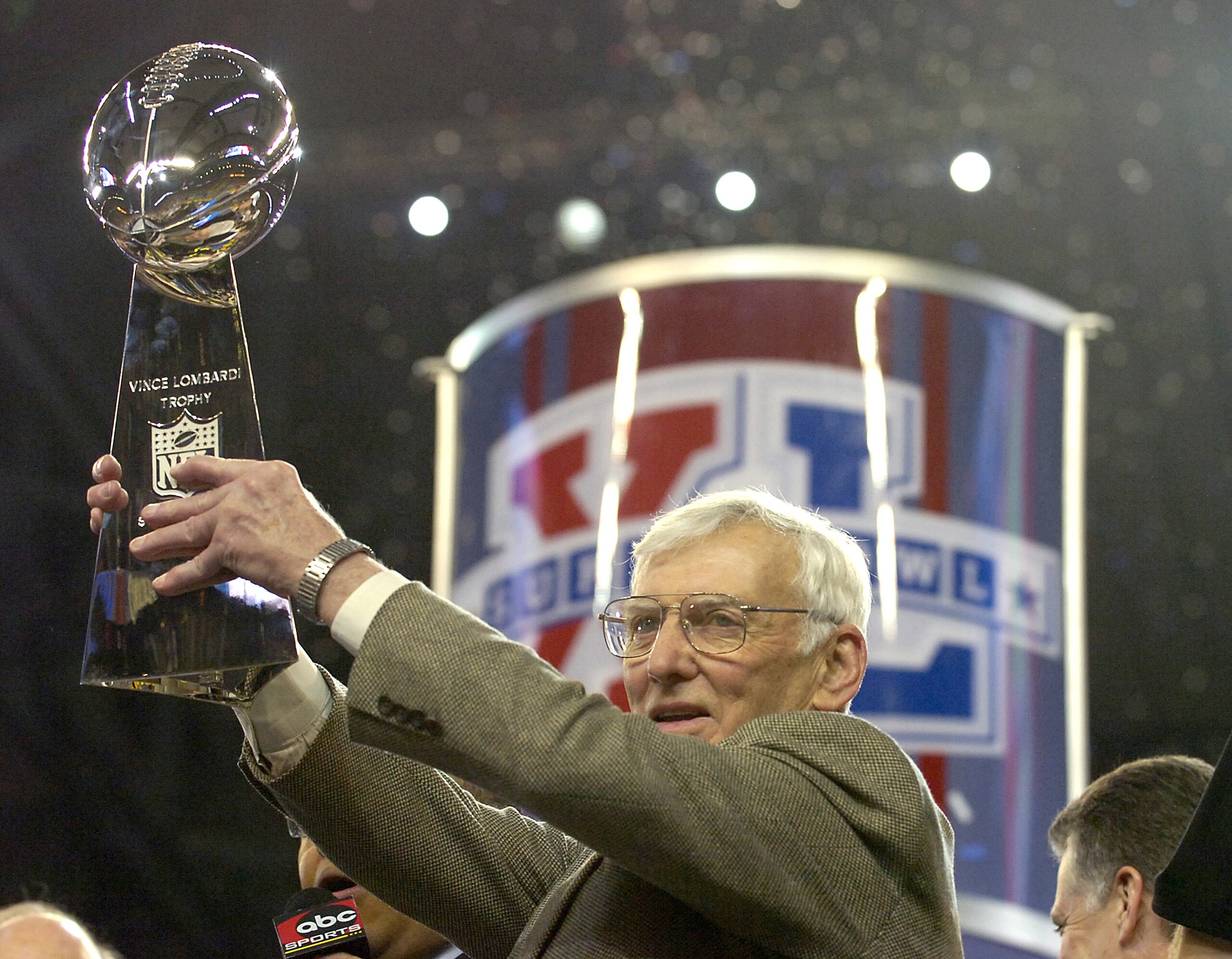 Steelers owner Dan Rooney hold the Vince Lombardi trophy after the Steelers won Super Bowl XL between the Pittsburgh Steelers and Seattle Seahawks at Ford Field in Detroit, Michigan on February 5, 2006.  (Photo by Al Messerschmidt/Getty Images)