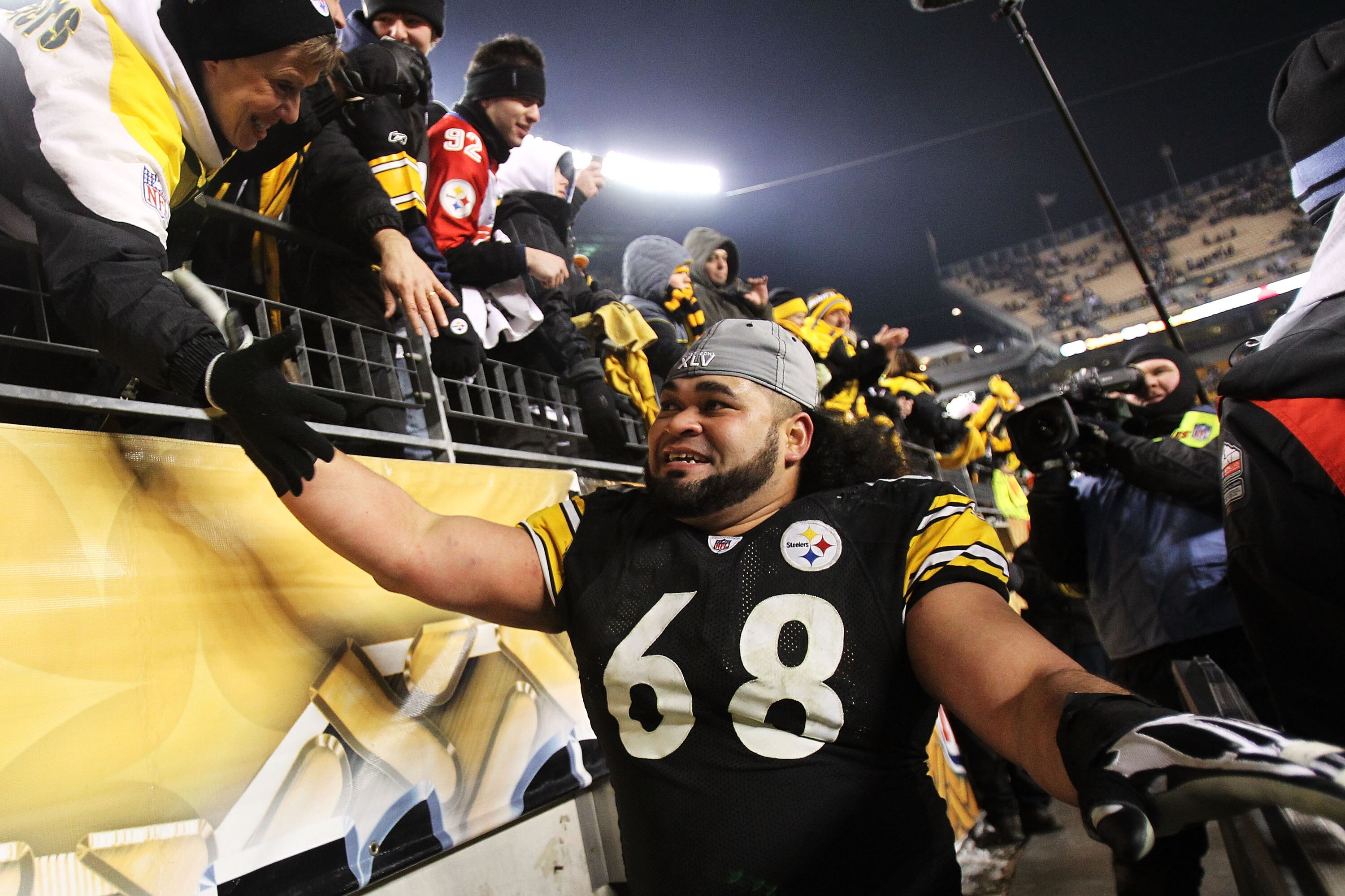 PITTSBURGH, PA - JANUARY 23:  Chris Kemoeatu #68 of the Pittsburgh Steelers celebrates after they defeated the New York Jets 24 to 19 in the 2011 AFC Championship game at Heinz Field on January 23, 2011 in Pittsburgh, Pennsylvania.  (Photo by Ronald Marti
