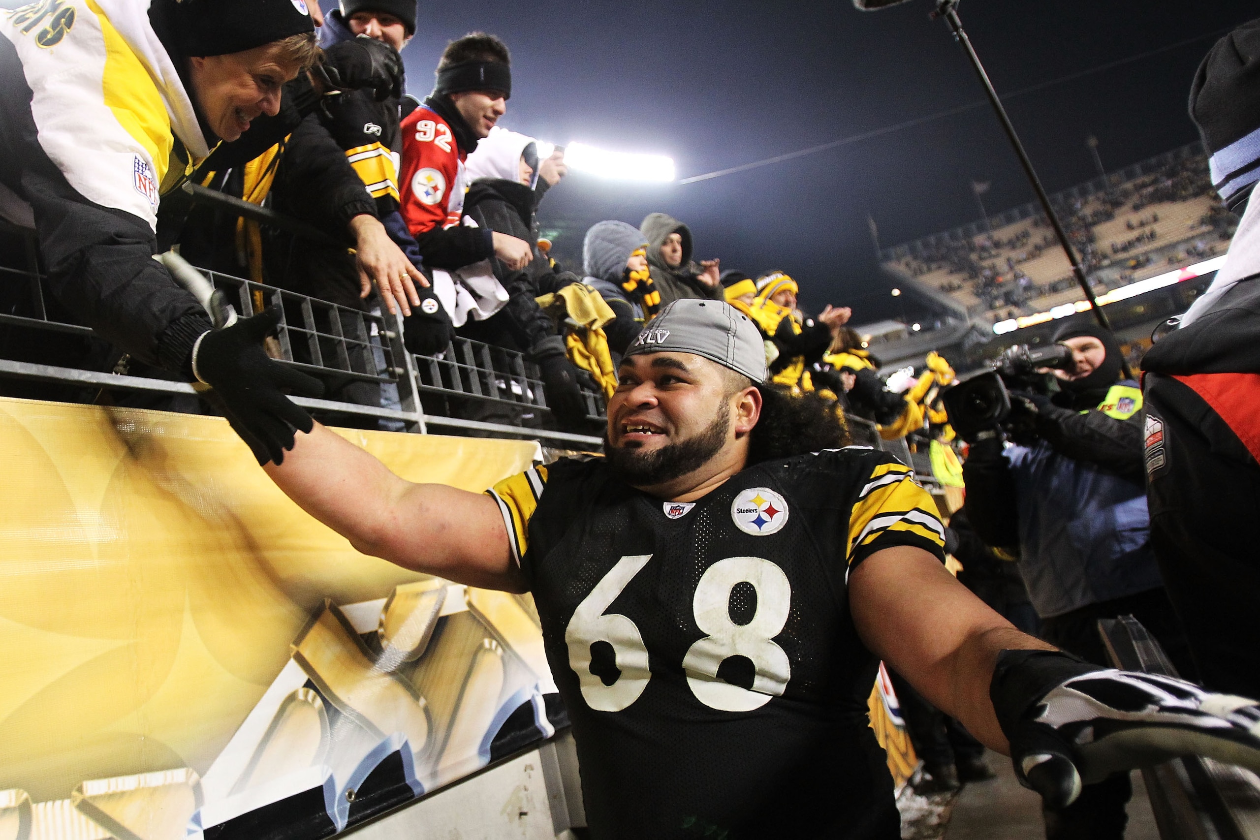 PITTSBURGH, PA - JANUARY 23:  Chris Kemoeatu #68 of the Pittsburgh Steelers celebrates after they defeated the New York Jets 24 to 19 in the 2011 AFC Championship game at Heinz Field on January 23, 2011 in Pittsburgh, Pennsylvania.  (Photo by Ronald Marti