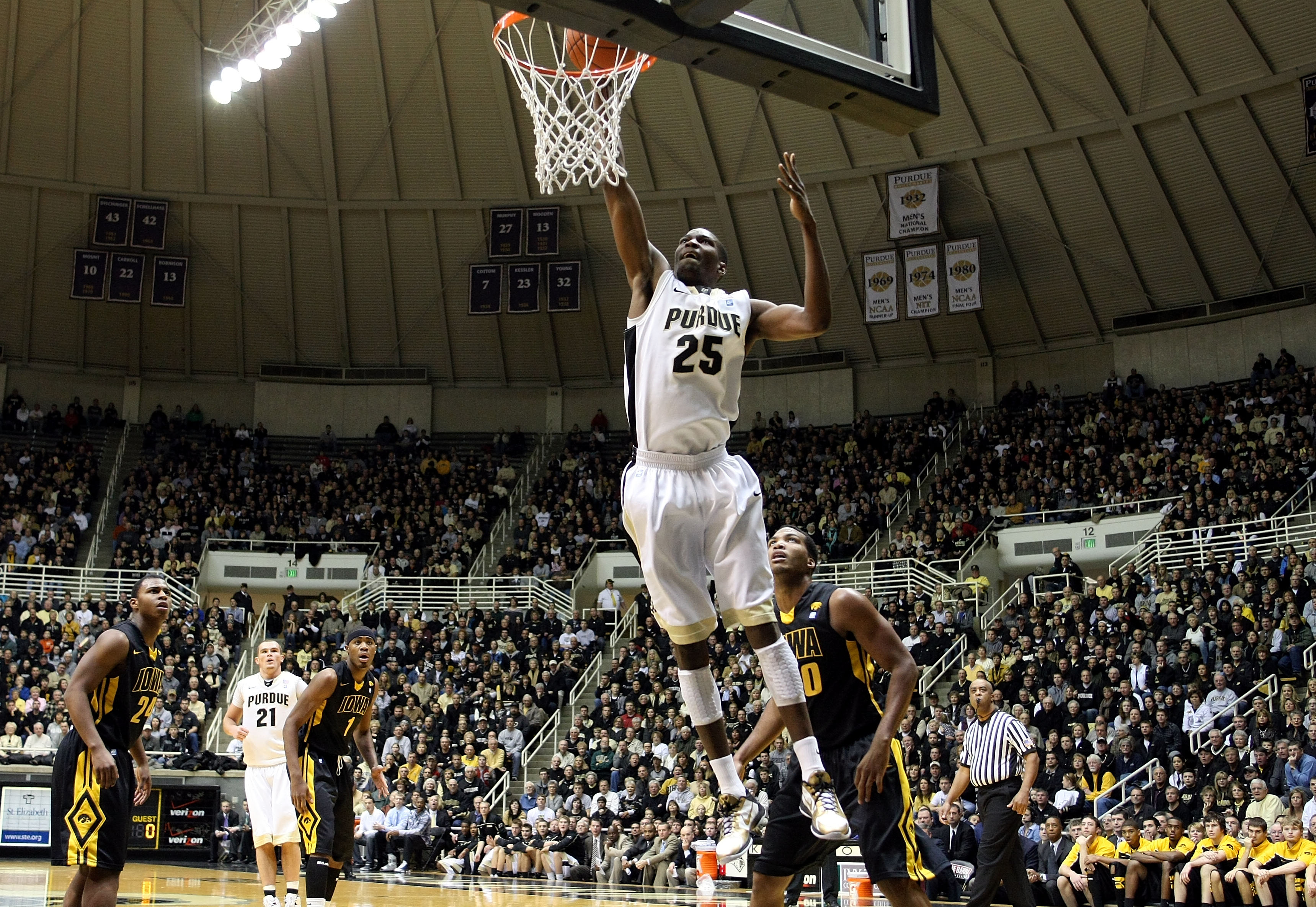 WEST LAFAYETTE, IN - JANUARY 09:  JaJuan Johnson #25 of the Purdue Boilermakers dunks in the first half against the Iowa Hawkeyes at Mackey Arena on January 9, 2011 in West Lafayette, Indiana.  (Photo by Chris Chambers/Getty Images)
