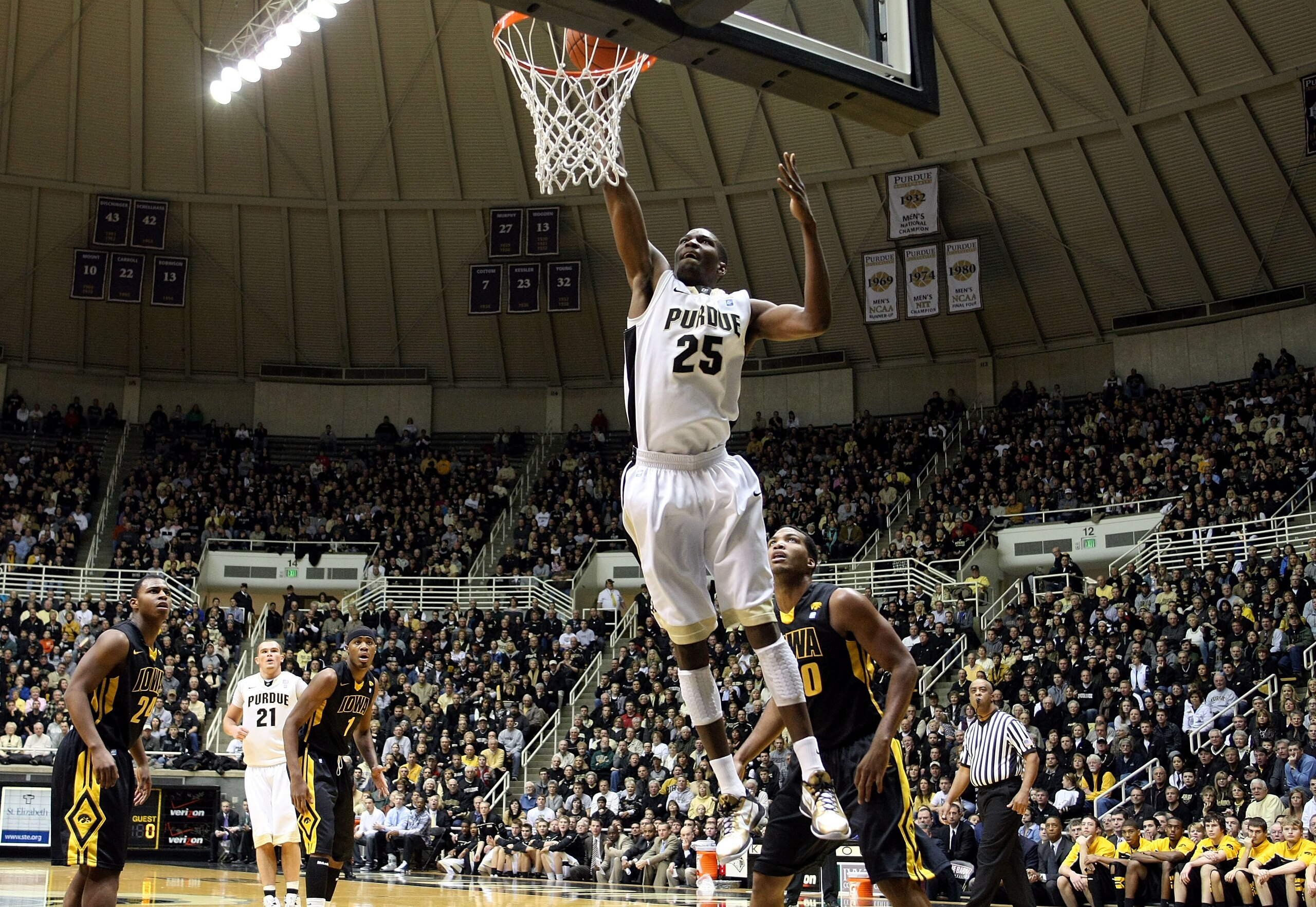 WEST LAFAYETTE, IN - JANUARY 09:  JaJuan Johnson #25 of the Purdue Boilermakers dunks in the first half against the Iowa Hawkeyes at Mackey Arena on January 9, 2011 in West Lafayette, Indiana.  (Photo by Chris Chambers/Getty Images)