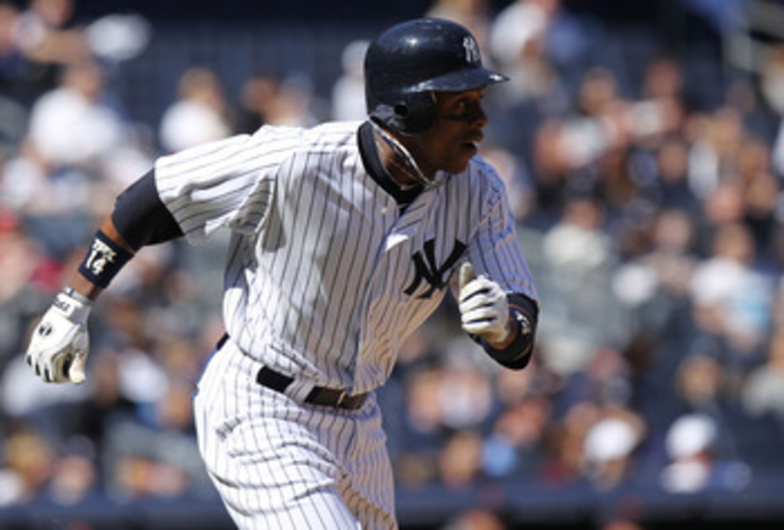 NEW YORK, NY - APRIL 03: Curtis Granderson #14 of the New York Yankees against the Detroit Tigers at Yankee Stadium on April 3, 2011 in the Bronx borough of New York City.  (Photo by Nick Laham/Getty Images)