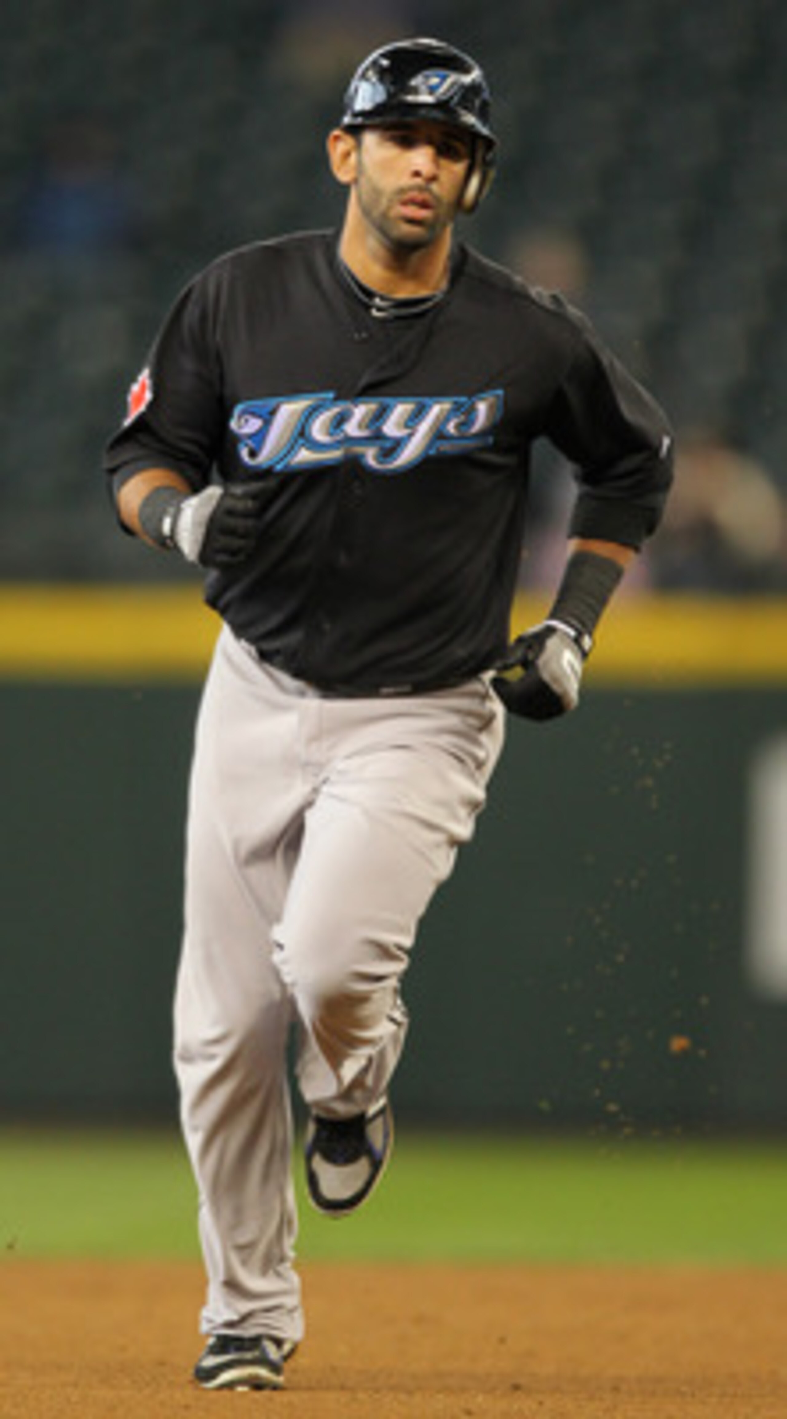 SEATTLE, WA - APRIL 13:  Jose Bautista #19 of the Toronto Blue Jays rounds the bases after hitting a three run homer in the eighth inning against the Seattle Mariners at Safeco Field on April 13, 2011 in Seattle, Washington. (Photo by Otto Greule Jr/Getty
