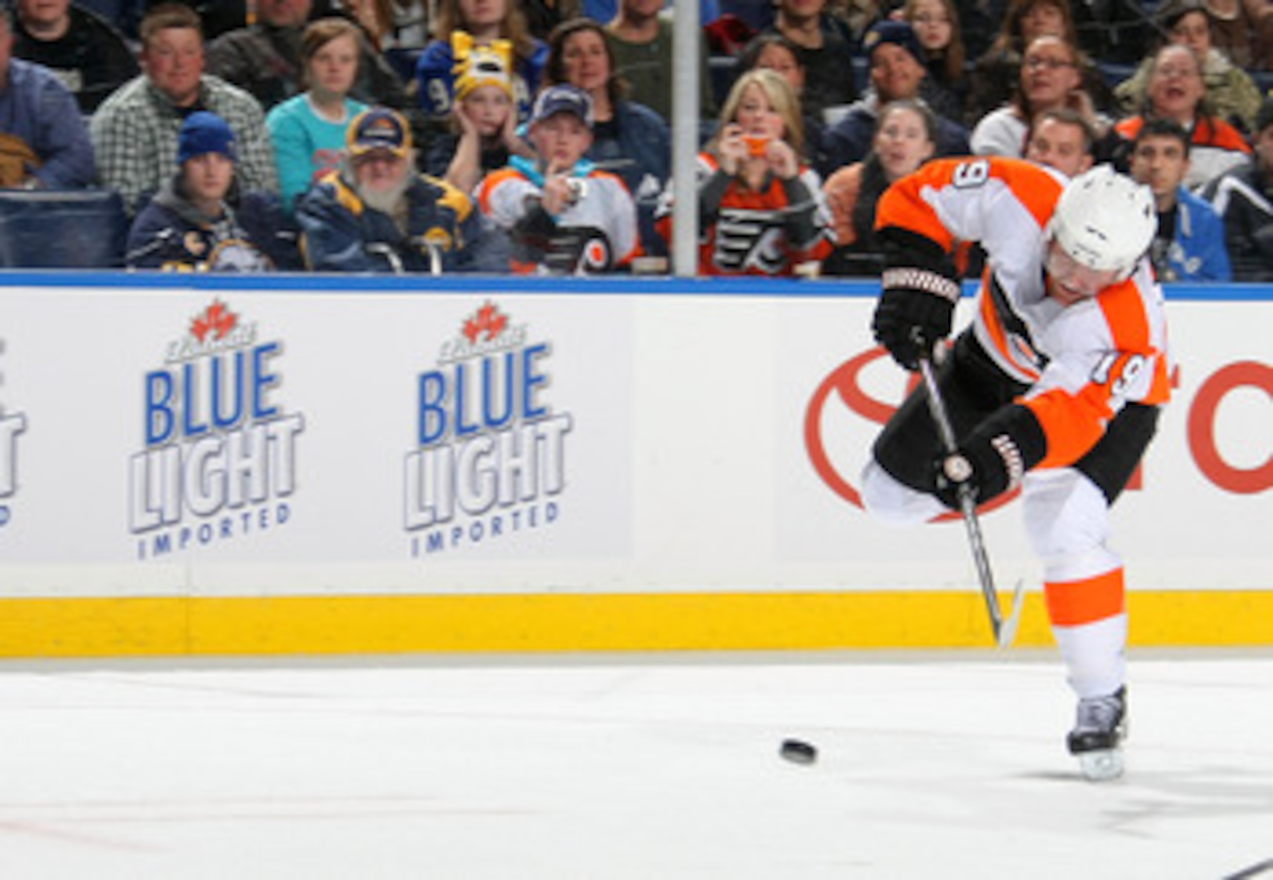 BUFFALO NY - JANUARY 11:  Scott Hatnell #19 of the Philadelphia Flyers shoots the puck into the empty net against the Buffalo Sabres during their NHL game at HSBC Arena January 11, 2011 in Buffalo, New York. (Photo By Dave Sandford/Getty Images)