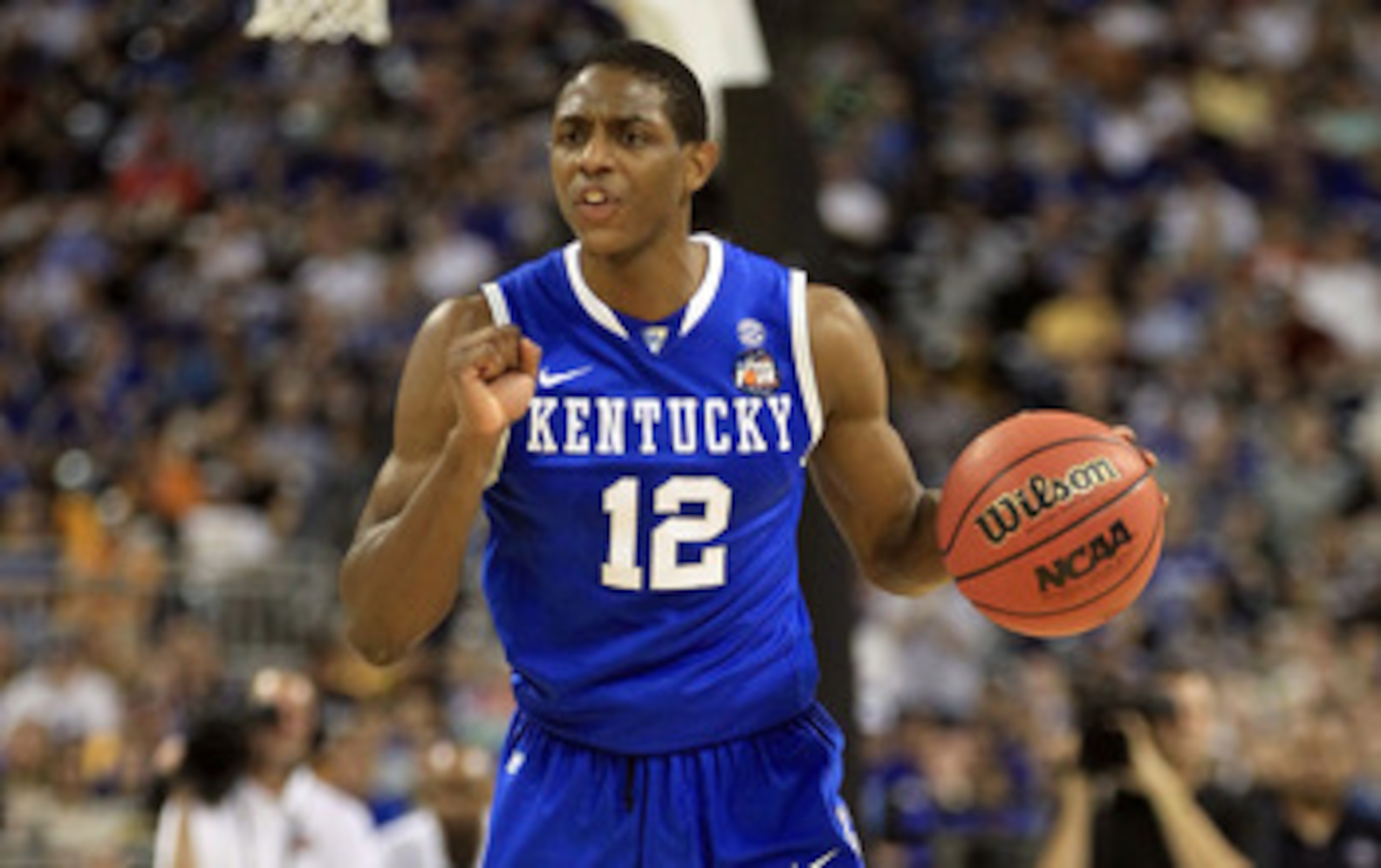 HOUSTON, TX - APRIL 02:  Brandon Knight #12 of the Kentucky Wildcats moves the ball while taking on the Connecticut Huskies during the National Semifinal game of the 2011 NCAA Division I Men's Basketball Championship at Reliant Stadium on April 2, 2011 in