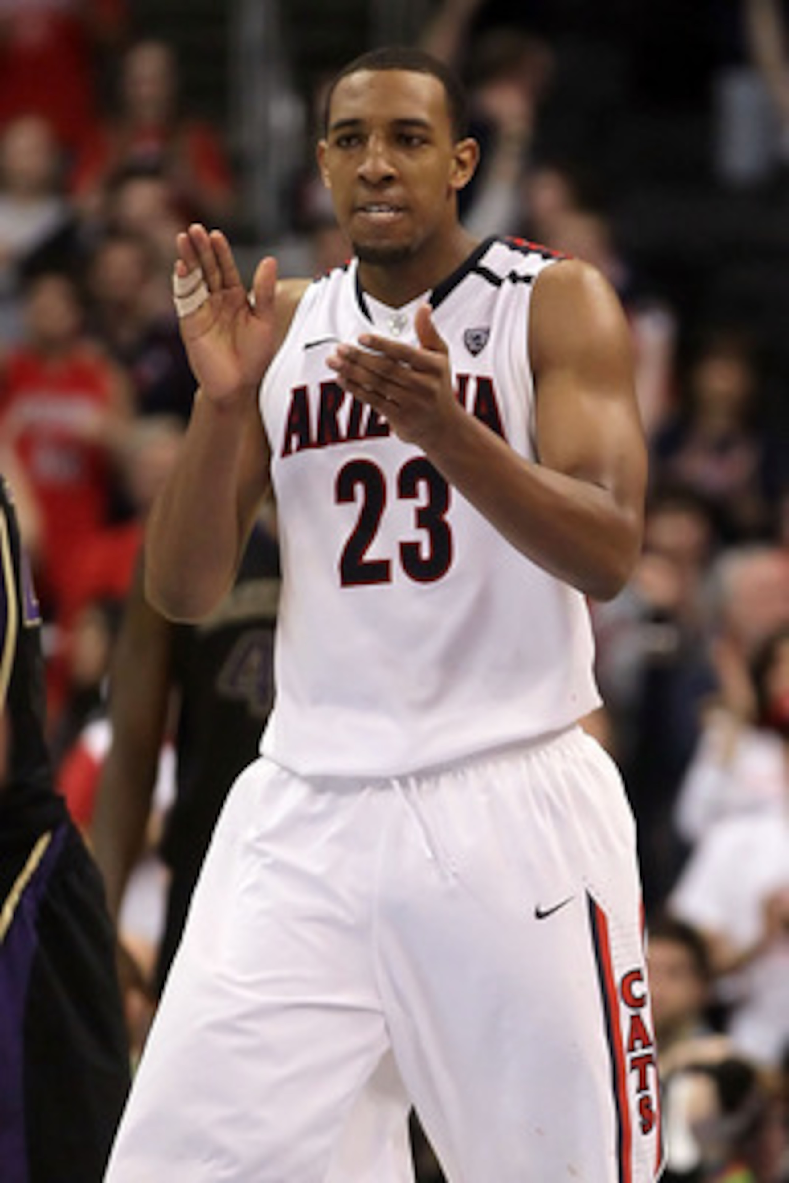 LOS ANGELES, CA - MARCH 12:  Derrick Williams #23 of the Arizona Wildcats reacts in the second half while taking on the Washington Huskies in the championship game of the 2011 Pacific Life Pac-10 Men's Basketball Tournament at Staples Center on March 12,
