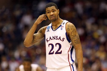 SAN ANTONIO, TX - MARCH 25:  Marcus Morris #22 of the Kansas Jayhawks reacts during the southwest regional of the 2011 NCAA men's basketball tournament against the Richmond Spiders at the Alamodome on March 25, 2011 in San Antonio, Texas. Kansas defeated